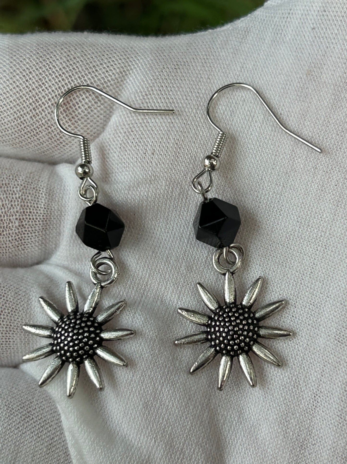 Faceted black agate bead drop earrings with antique silver flower