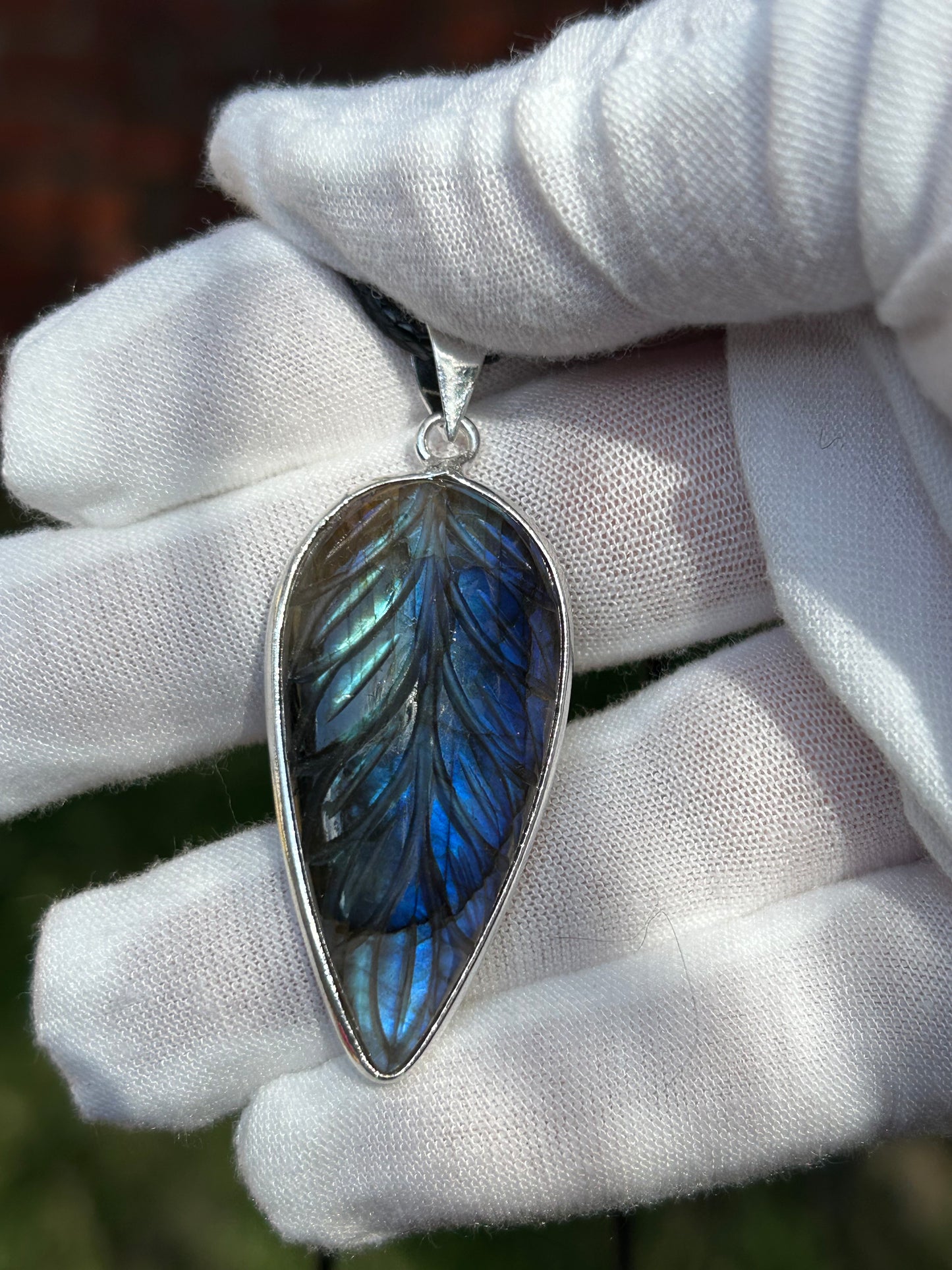Carved blue flash tear drop rain drop Labradorite pendant set in 925 Sterling Silver Plated Pendant setting