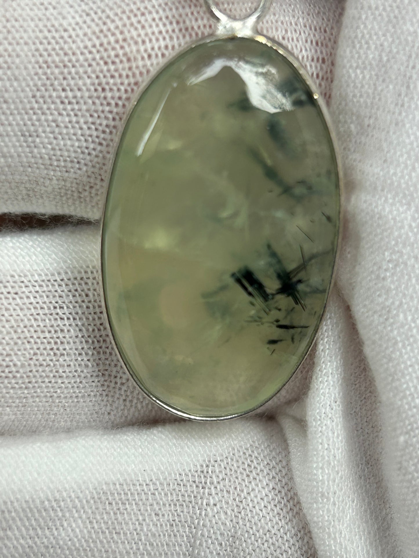 Green Prehnite crystal oval shaped pendant set in silver