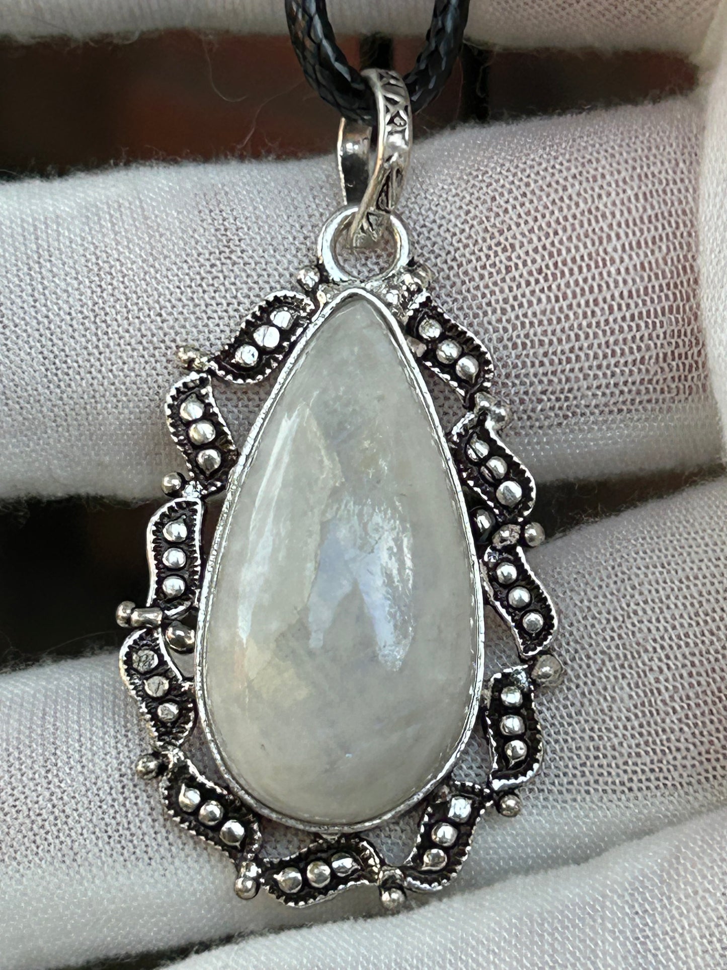 Handmade moonstone tear drop raindrop pendant intricate sterling silver setting unique