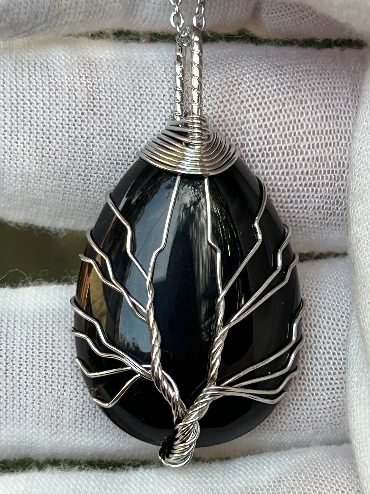 Large polished black agate silver wire wrapped pendant with tree design