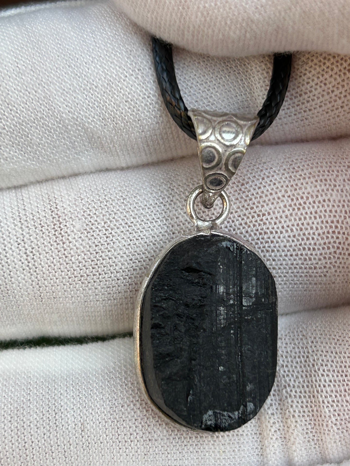 Textured Black Tourmaline 925 Sterling Silver Plated Oval Pendant with black cord necklace