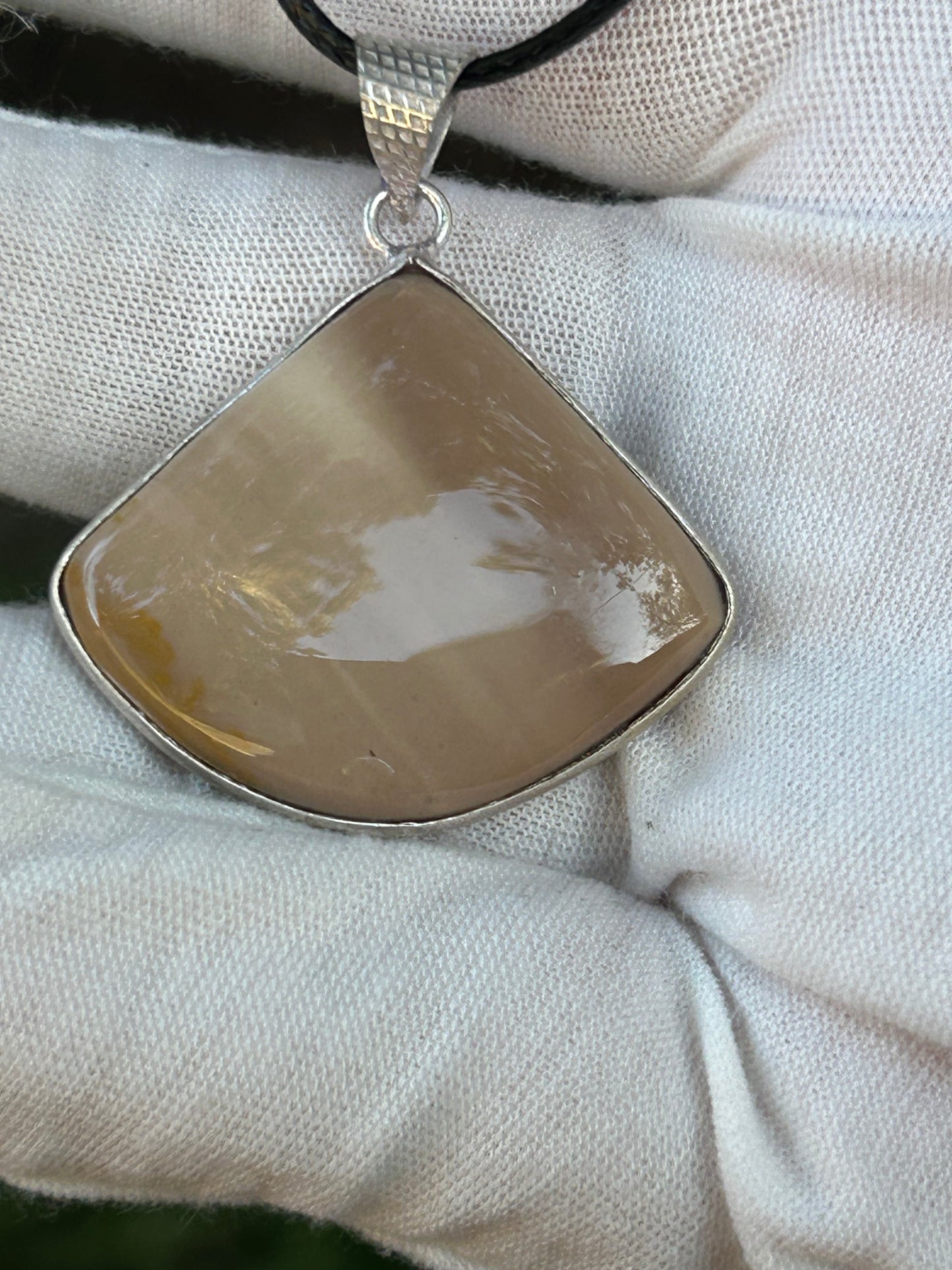 Mookaite fan shaped pendant set in silver silver pendant fixture