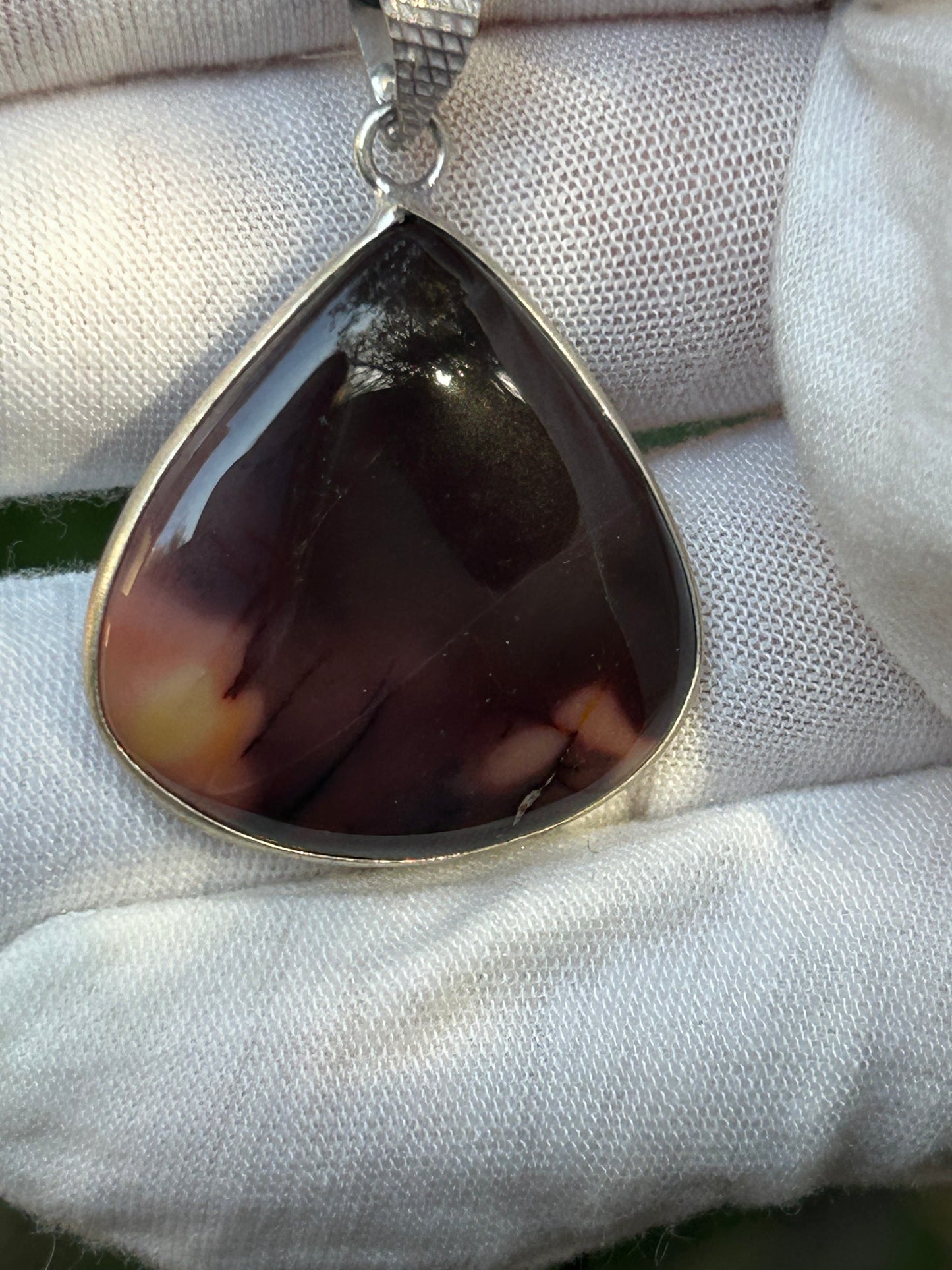Mookaite teardrop raindrop pendant set in silver silver pendant fixture brown tones