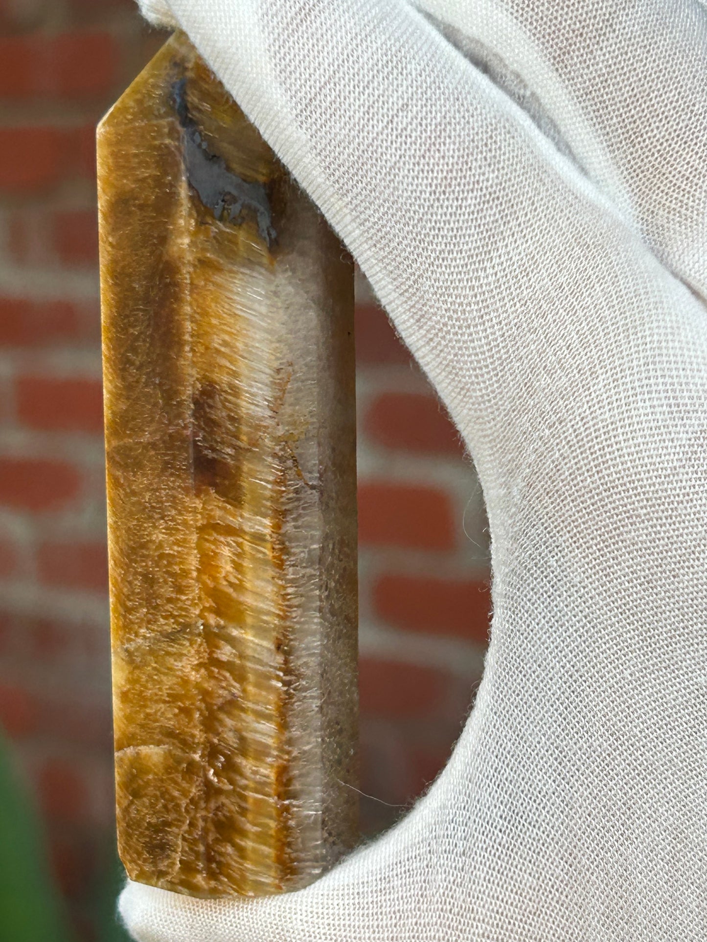 Brown and gold tigers eye point