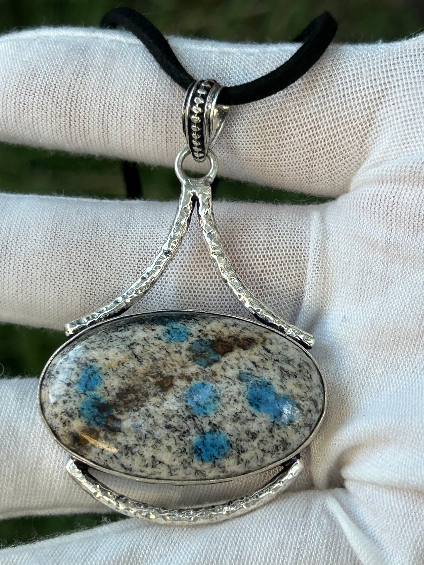 Large Oval K2 stone pendant set in unique handmade design sterling silver setting with black cord necklace