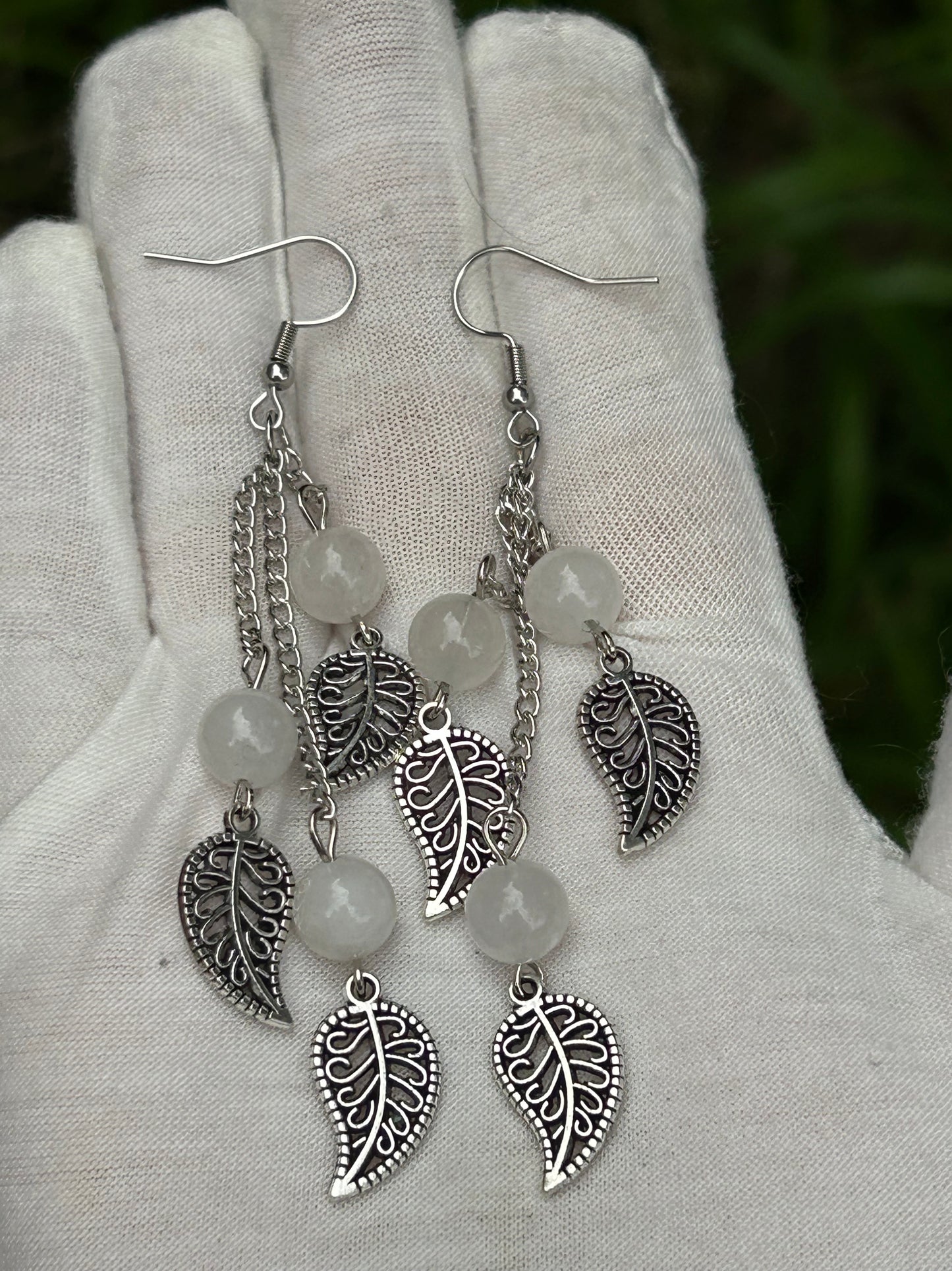Silver leaf design drop earrings with white Jade beads