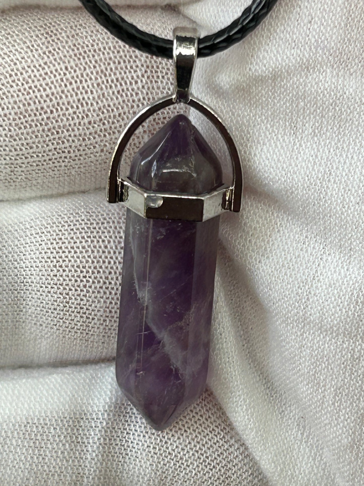 Amethyst double point crystal pendant with silver setting