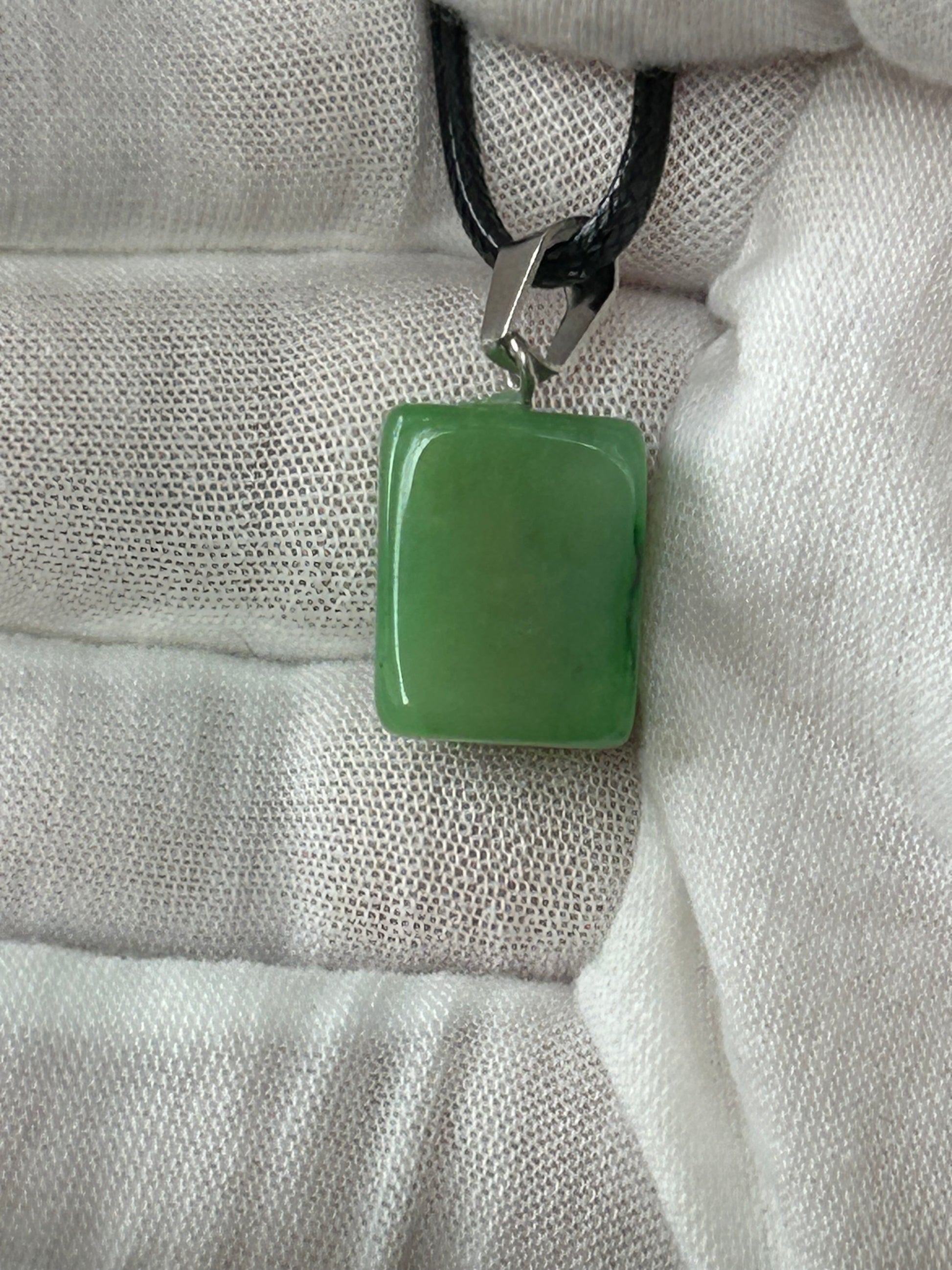 Green aventurine crystal square polished stone pendant with silver attachment and black cord necklace