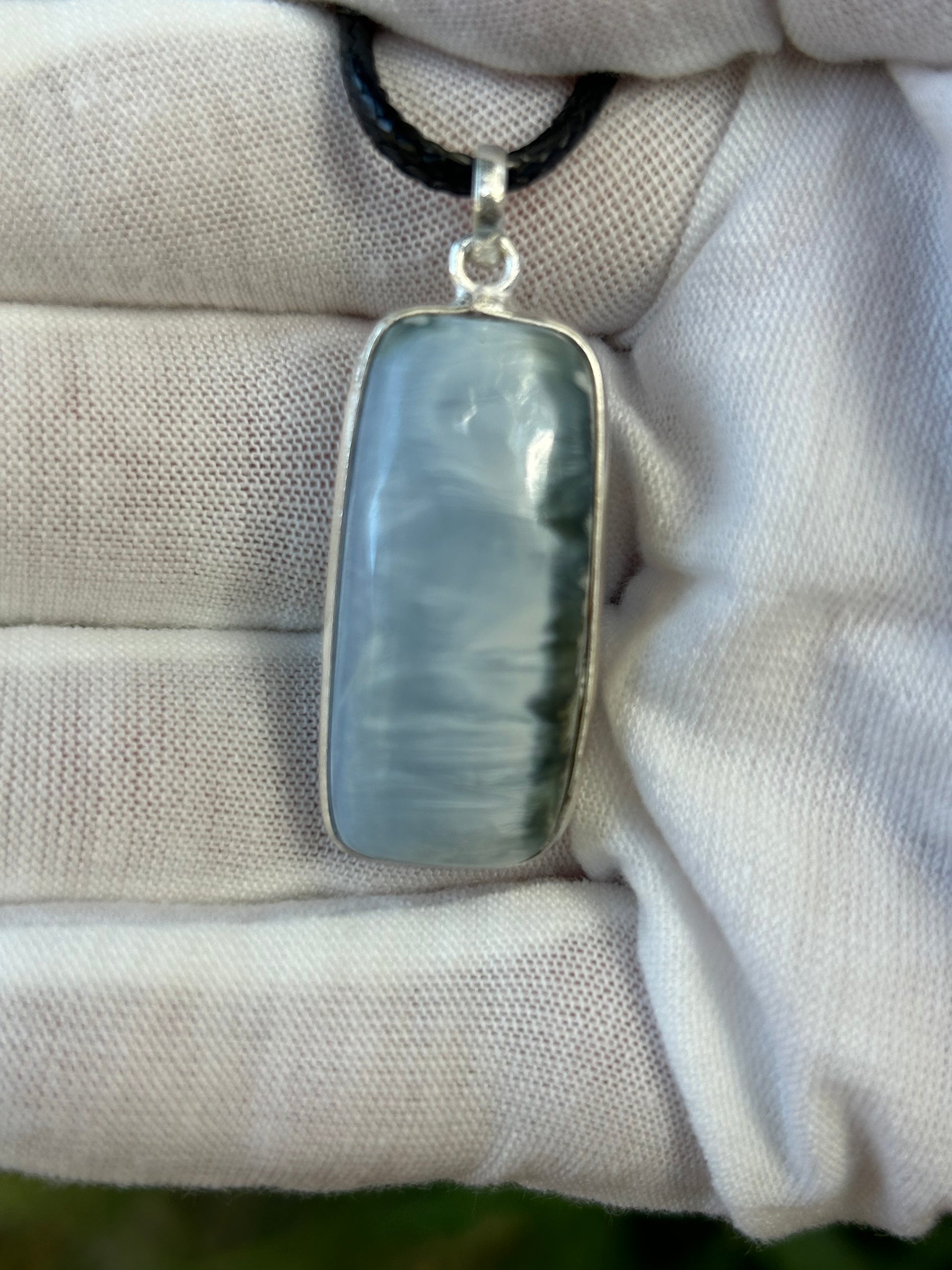 Rectangular Blue Opal pendant in sterling silver setting