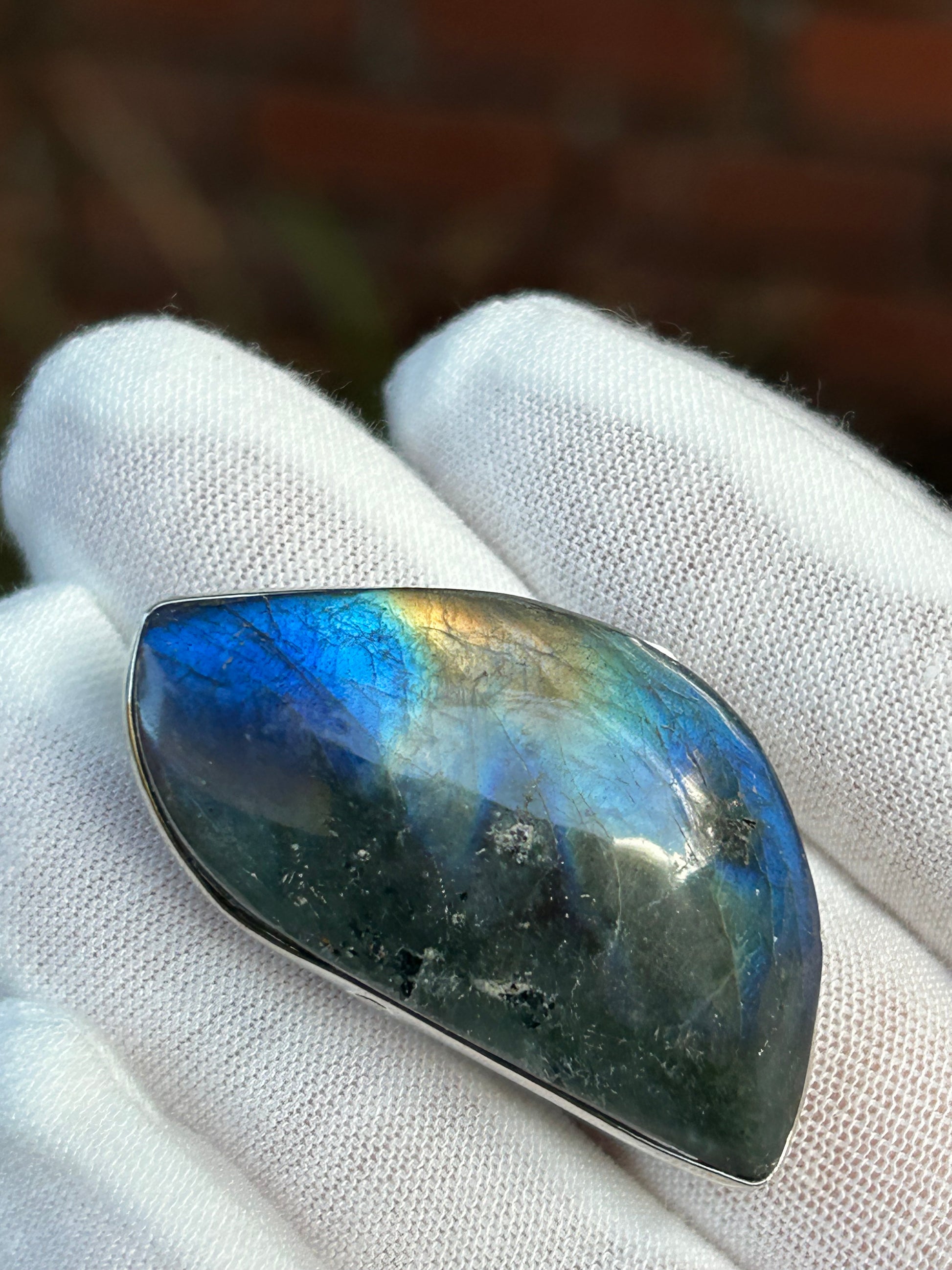 Large Labradorite Blue Flash Gold flash Adjustable Ring set in silver