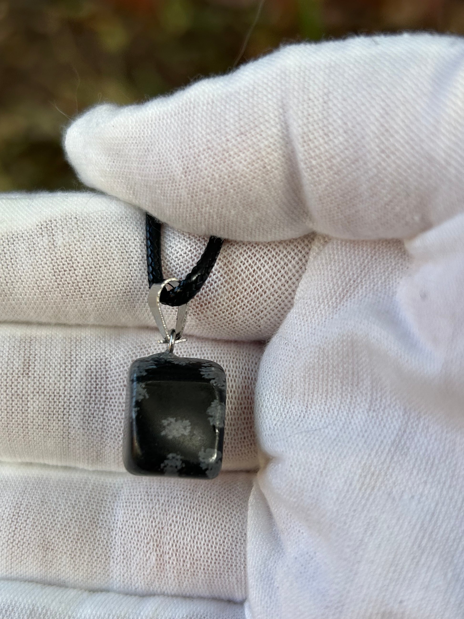 Snowflake Obsidian Square Polished Stone Pendant with silver pendant attachment and black cord necklace