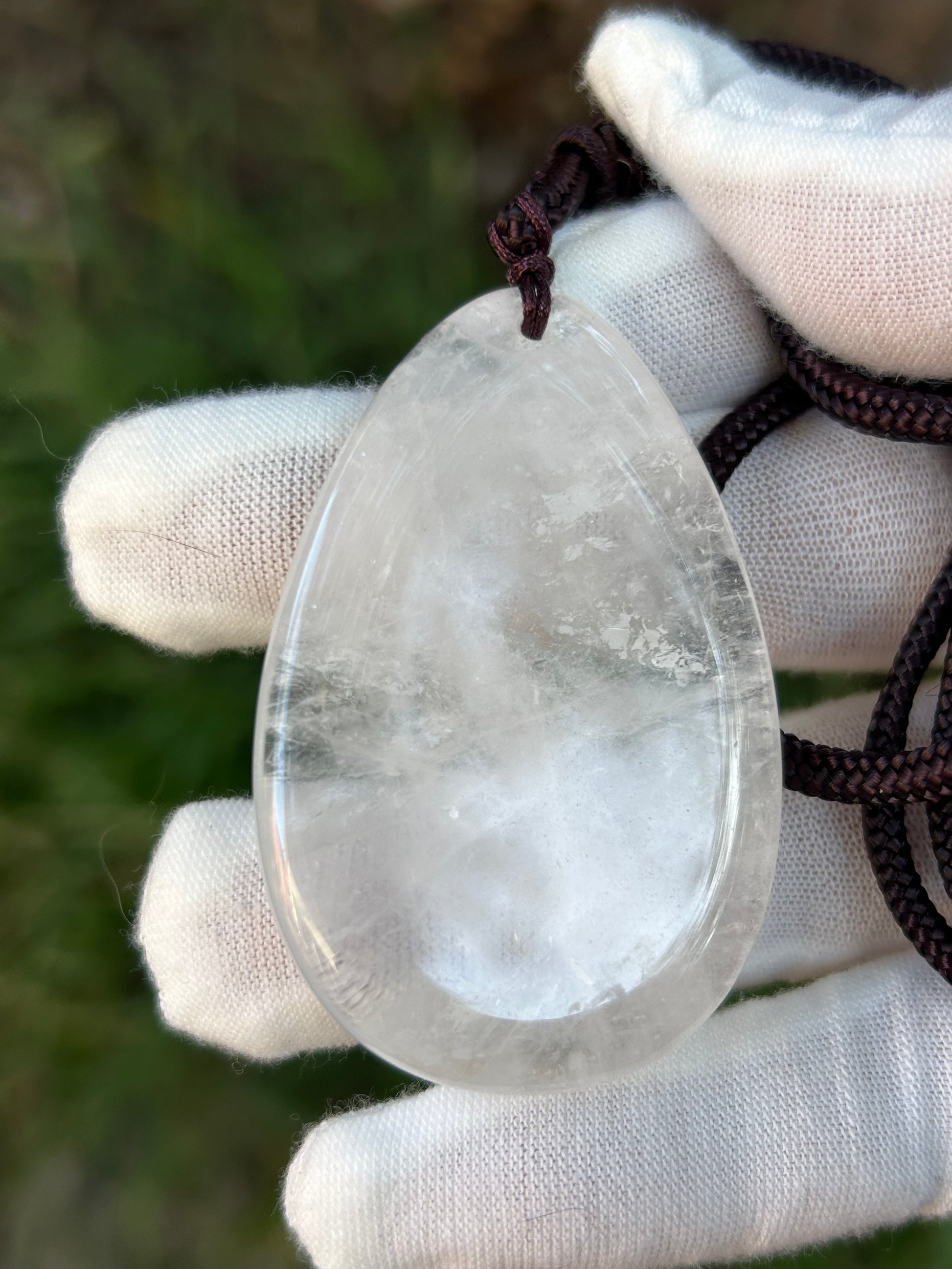 Large Clear quartz oval pendant with brown cord necklace