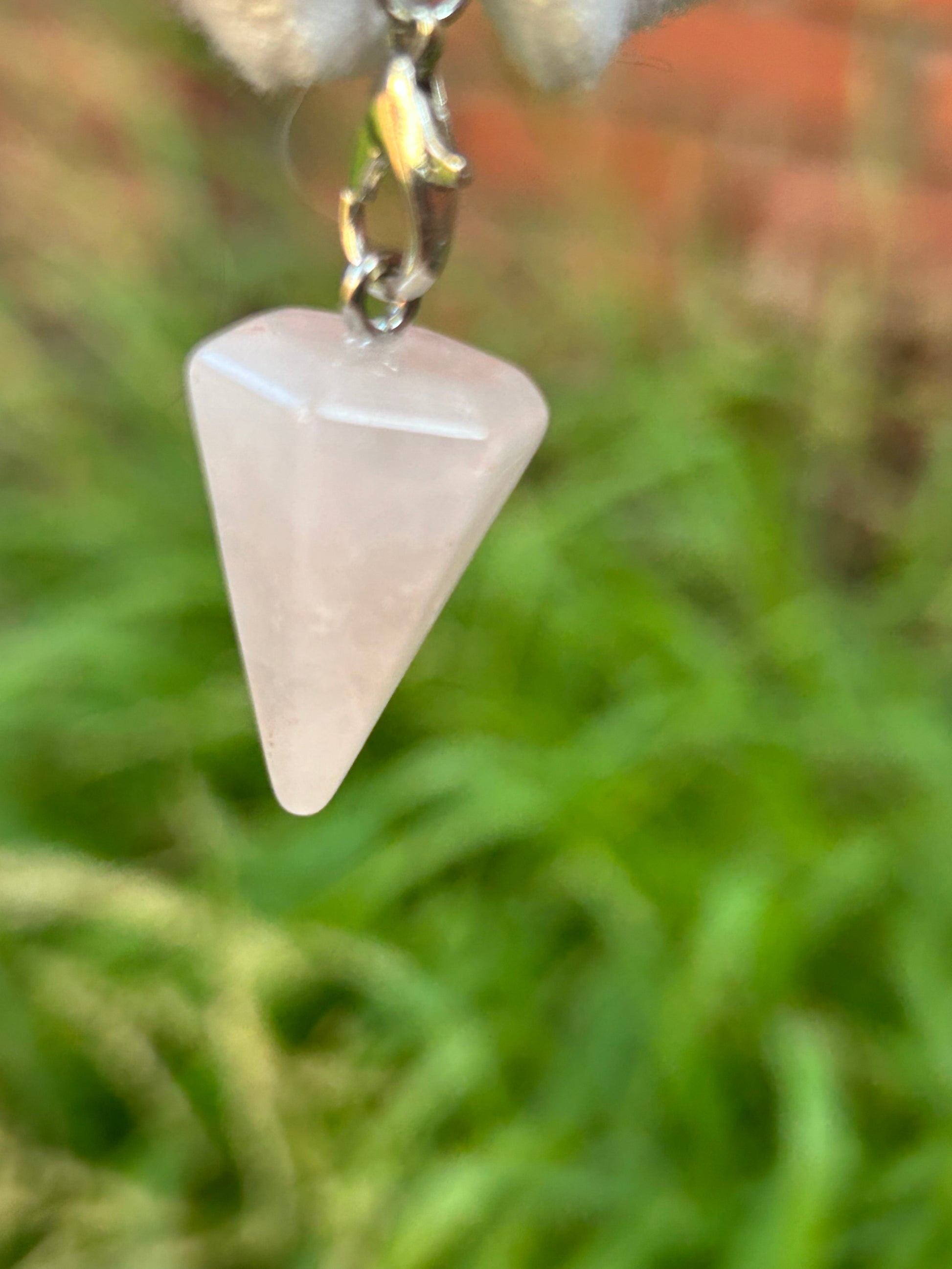 rose quartz crystal point pendulum with silver chain