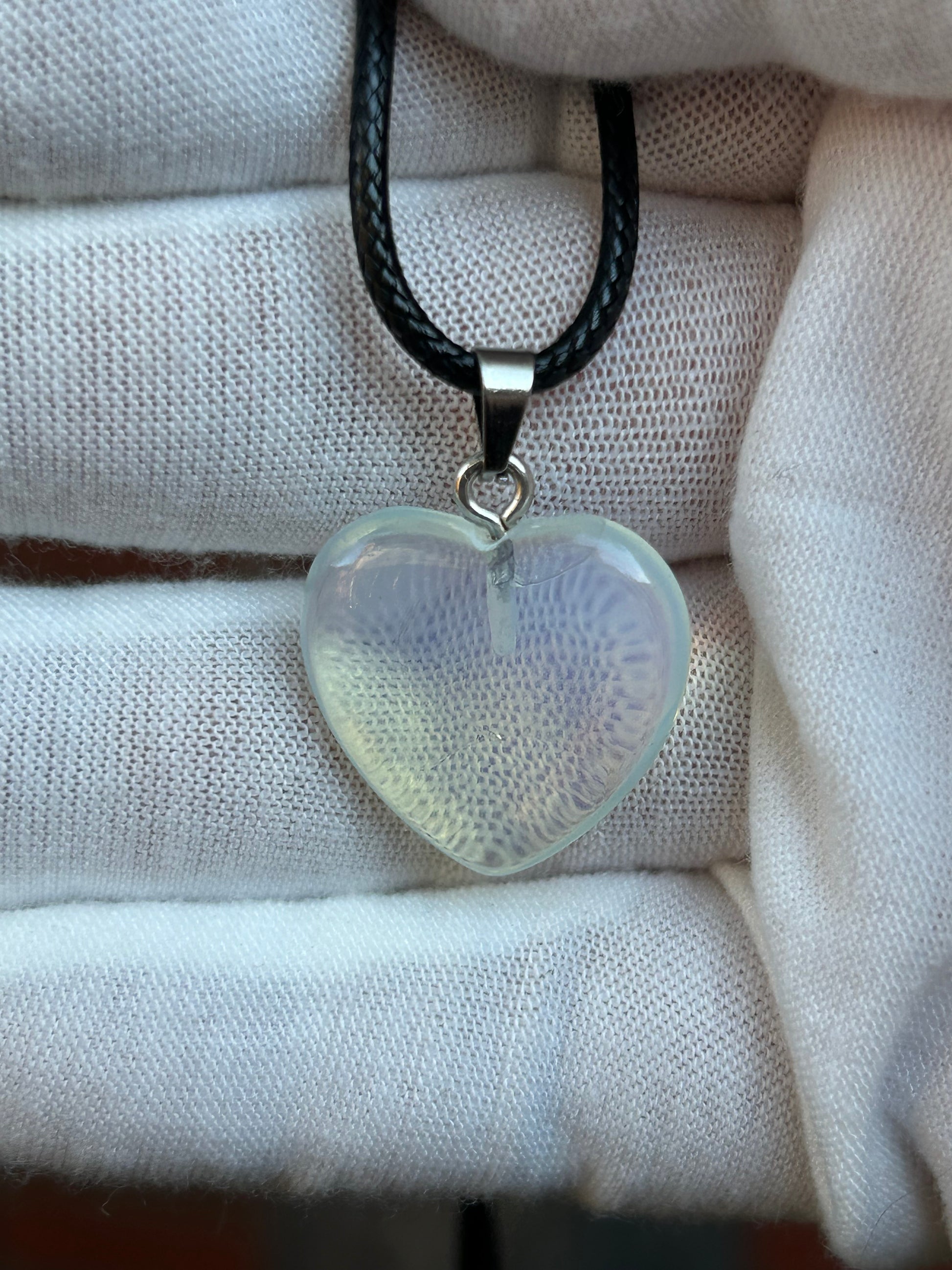 Yellow Agate Polished Heart Pendant with silver pendant attachment and black cord necklace