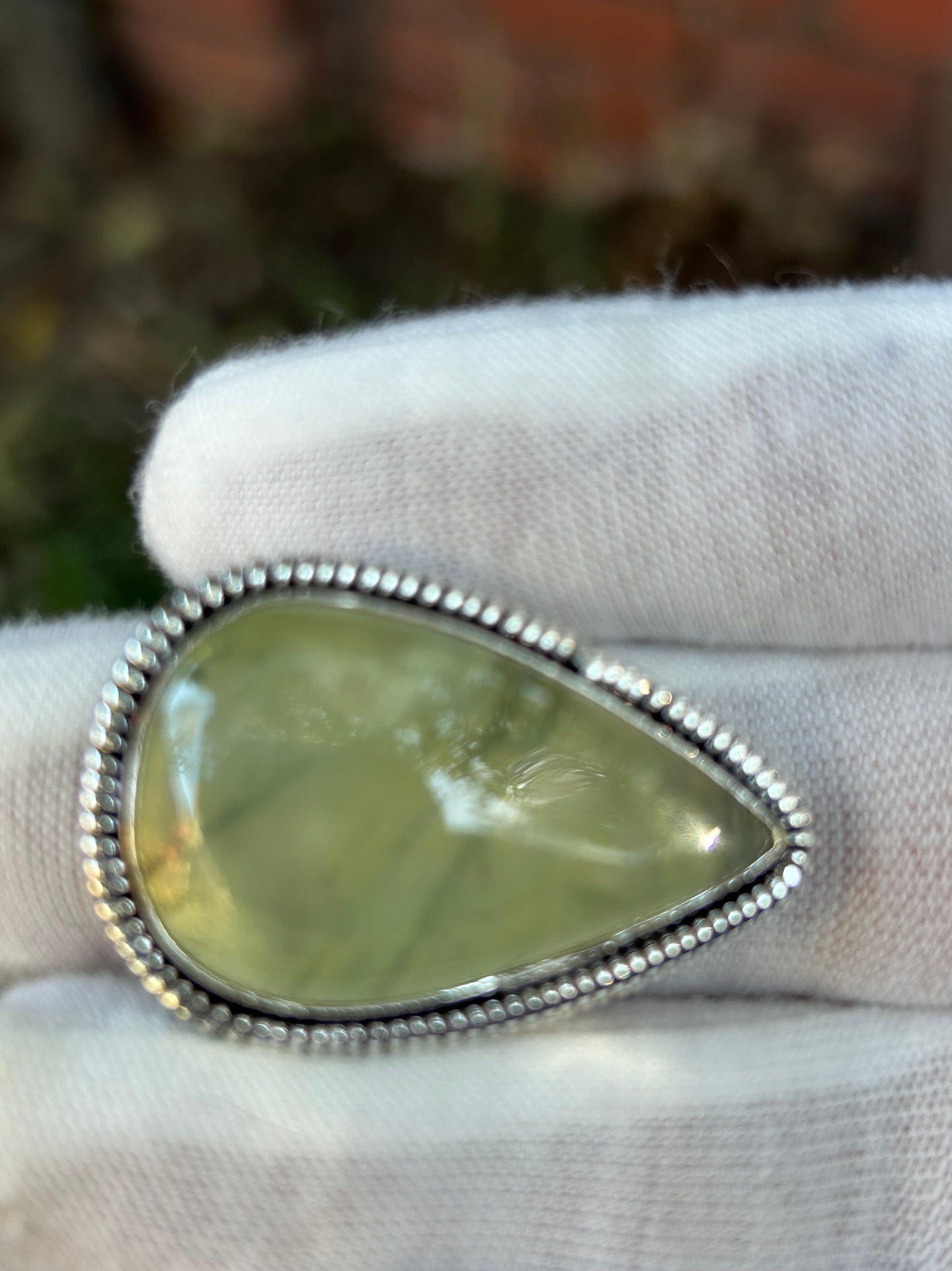 Green Prehnite crystal waterdrop tear drop shaped statement ring set in unique sterling silver design