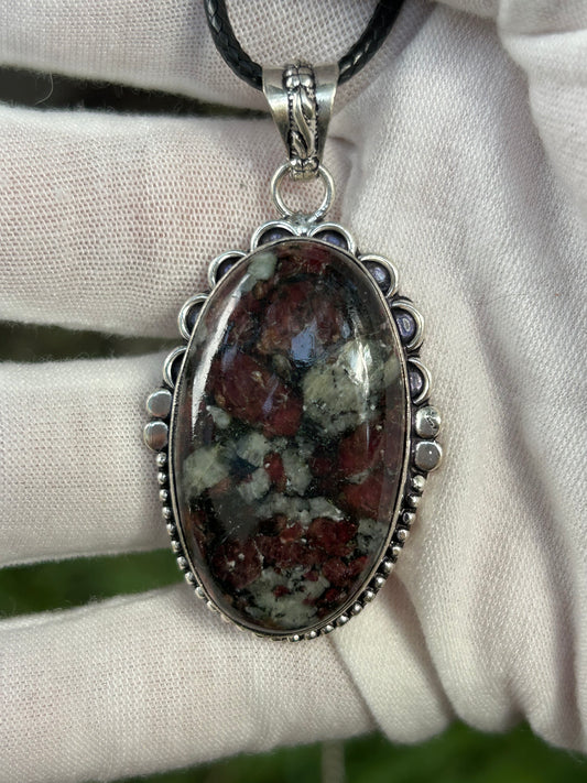 Striking eudialyte crystal gemstone handmade pendant set in ornate antique silver