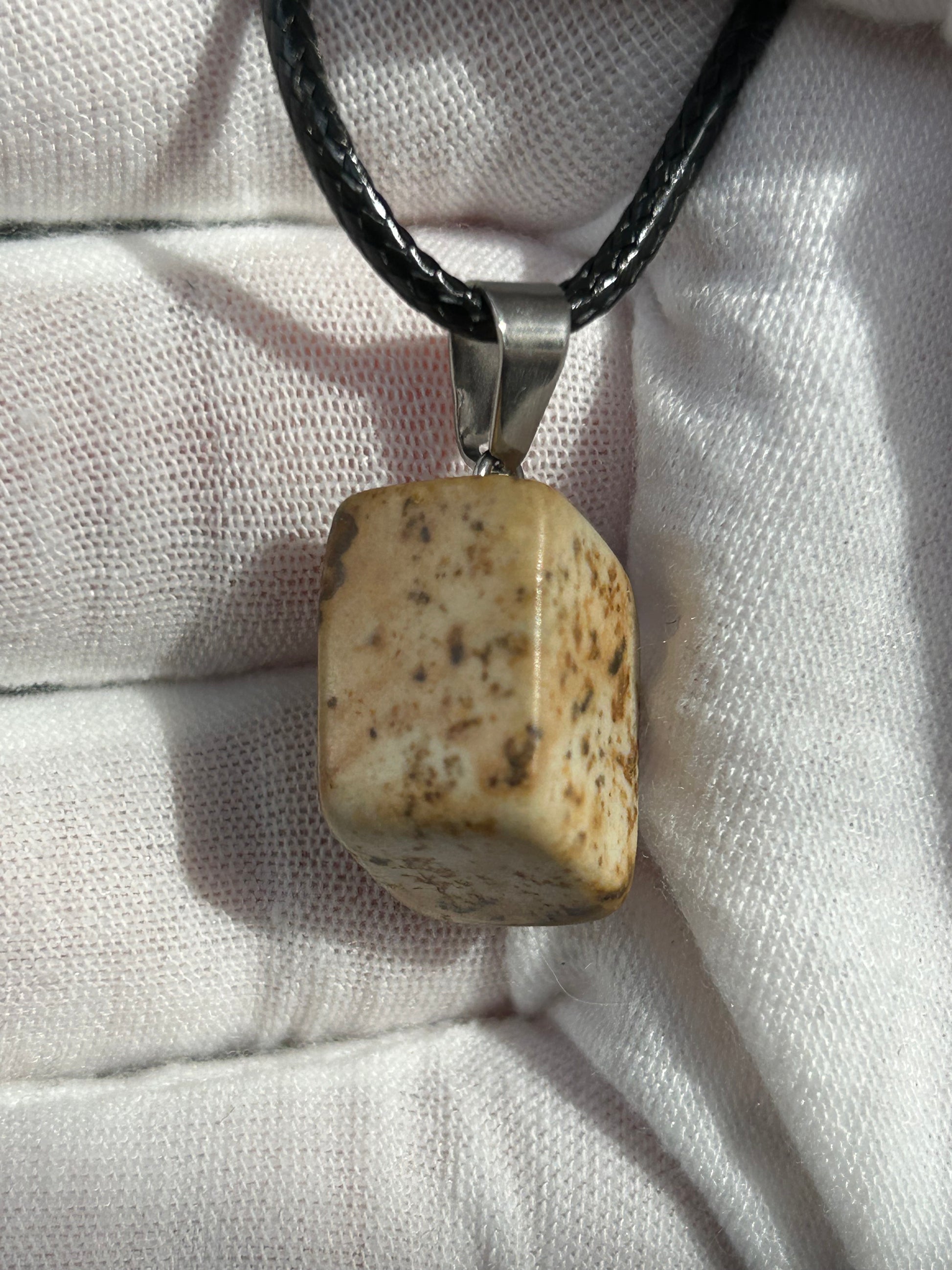 small Spotted Picture jasper square polished pendant with silver pendant attachment and black cord necklace