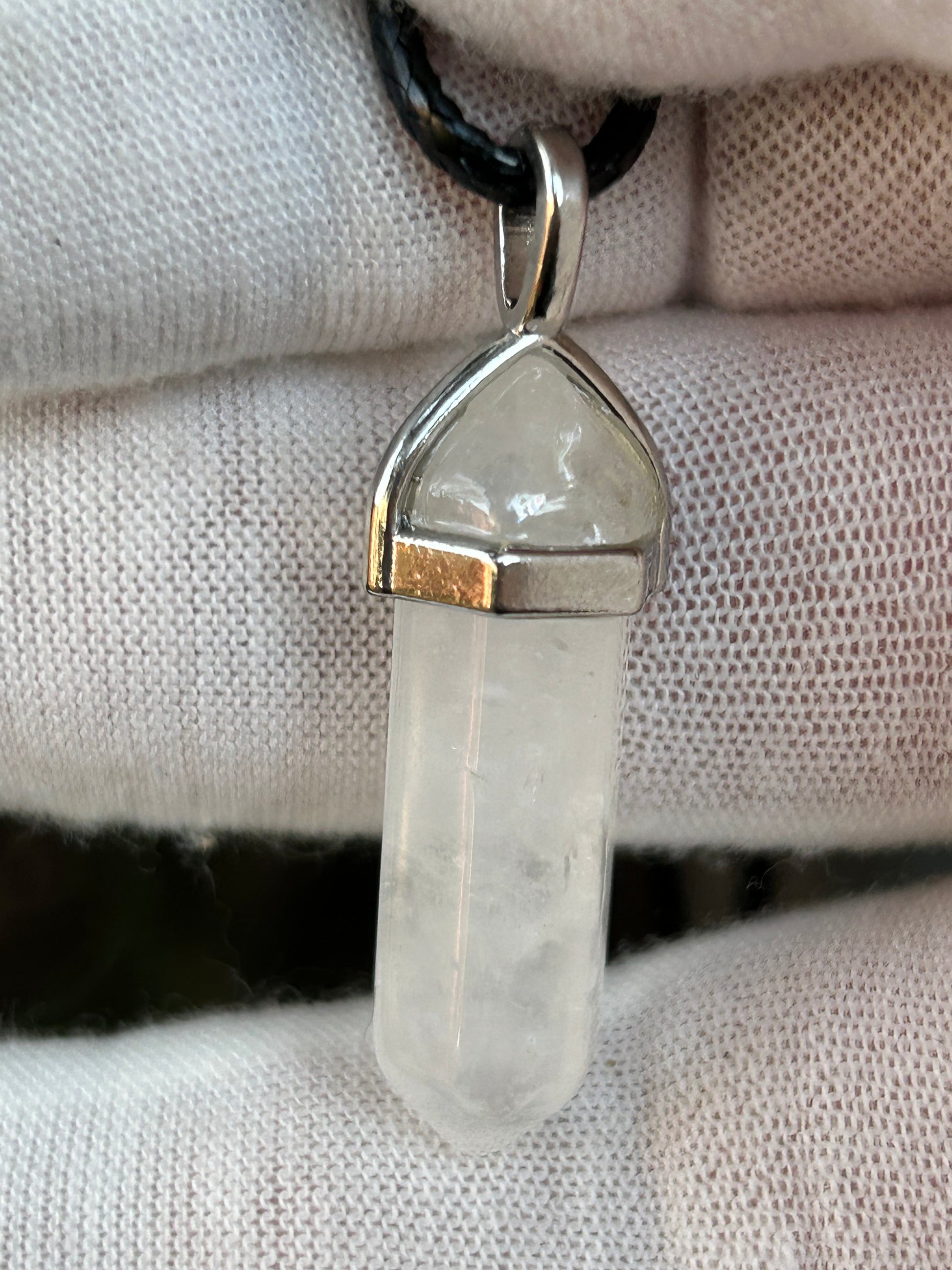 White Quartz Crystal Polished Point Pendant in silver setting and with black cord necklace