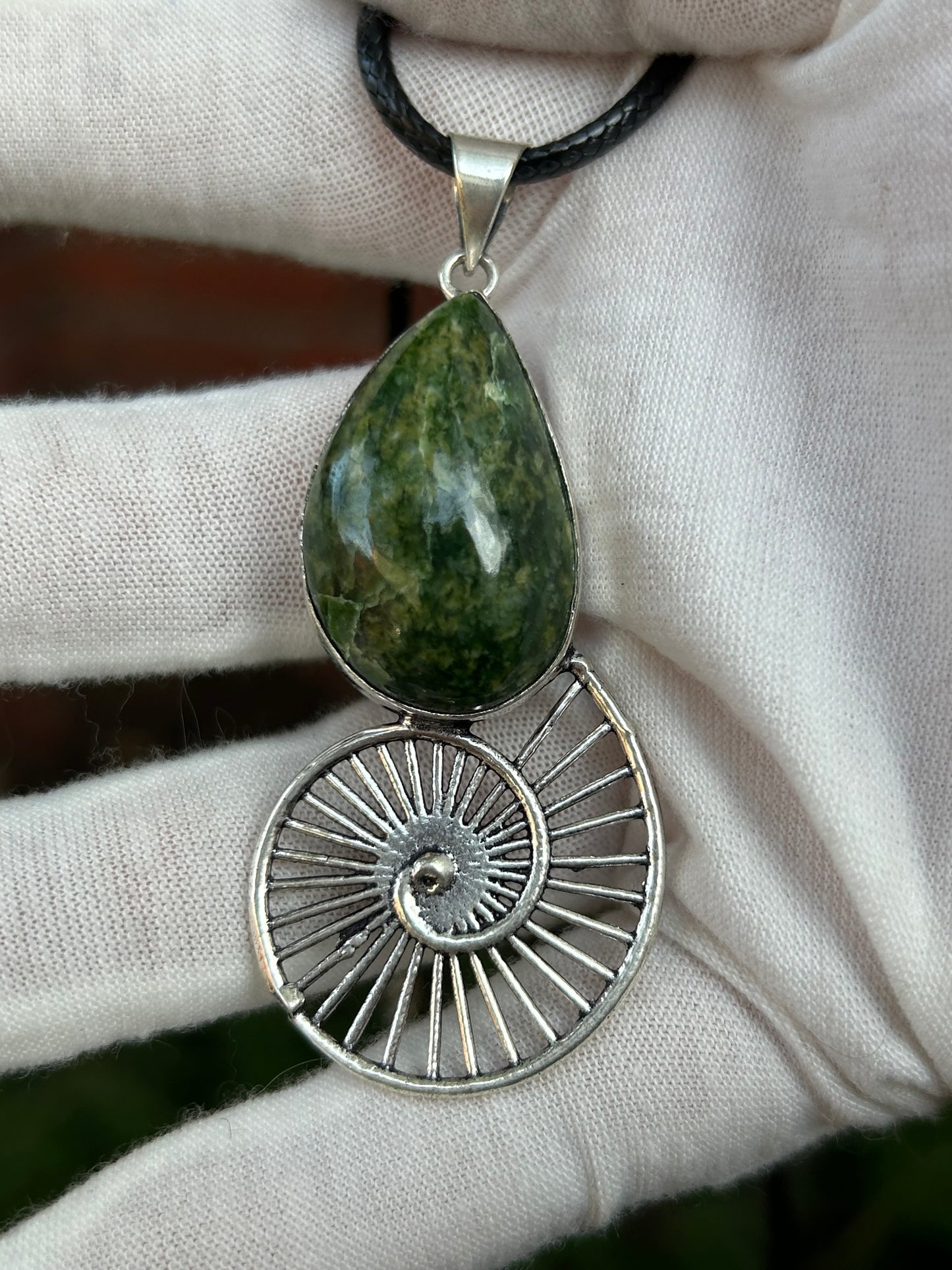 green unakite handmade pendant with sterling silver swirl at the base