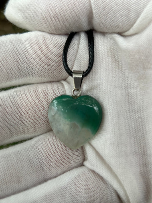 Green and white agate polished heart pendant with silver pendant attachment and black cord necklace