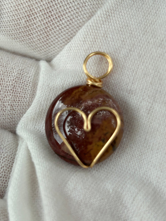 Small round red jasper polished pendant or charm with wire wrapped gold heart