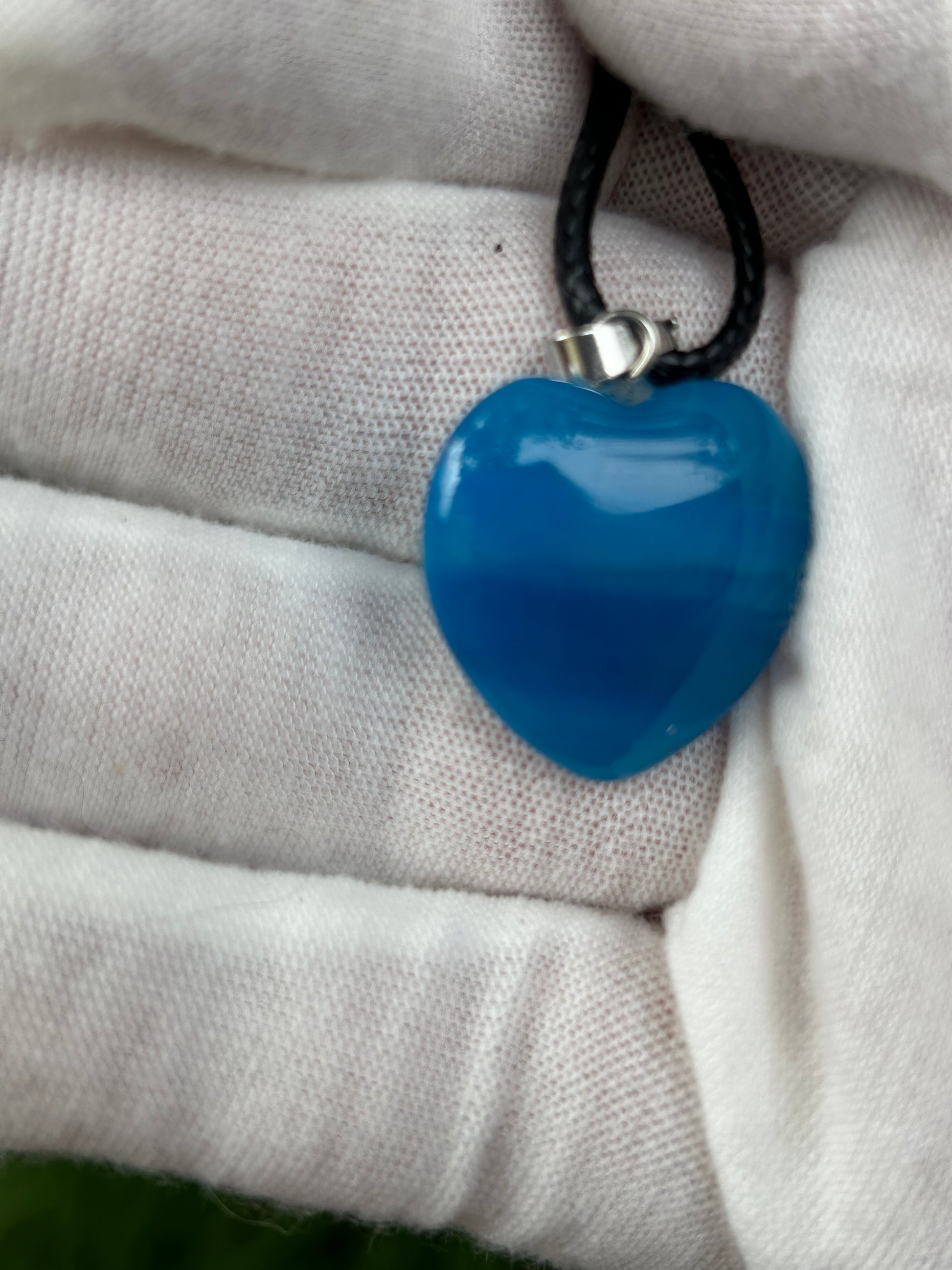 light blue mid Blue agate polished crystal heart shaped pendant with silver pendant connector black cord necklace