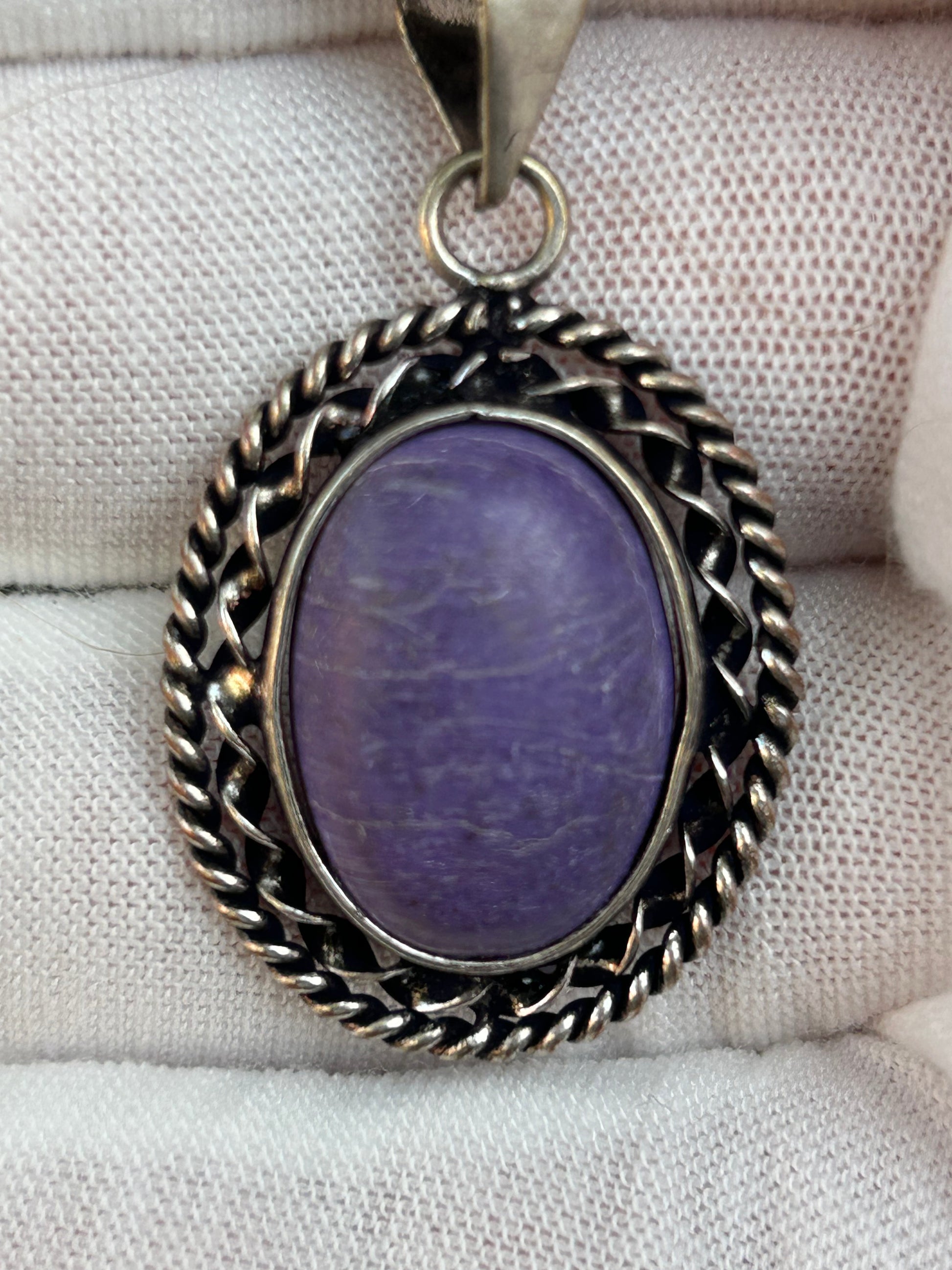 Charoite stone oval pendant in intricate antique silver setting