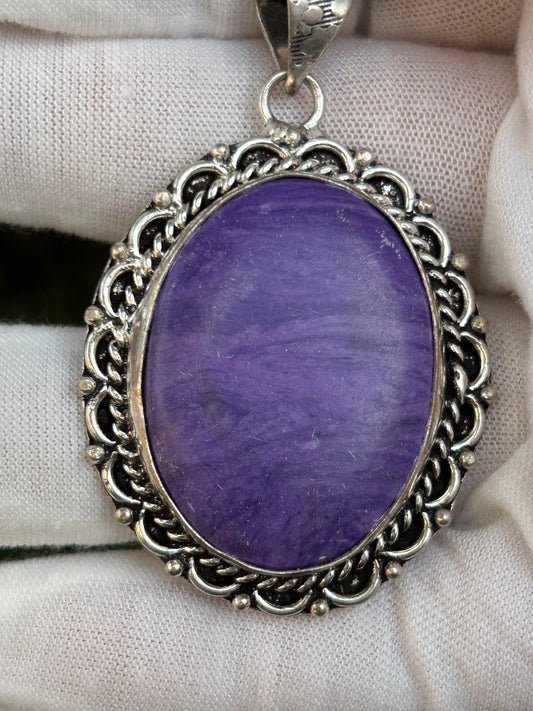 Purple Charoite stone oval pendant in intricate antique silver setting