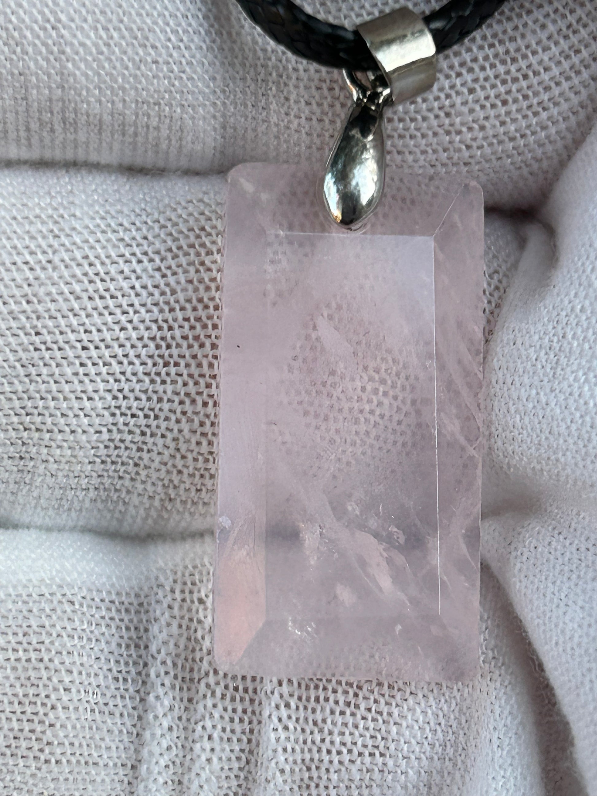 Rose Quartz Rectangular polished pendant with silver pendant attachment and black cord necklace