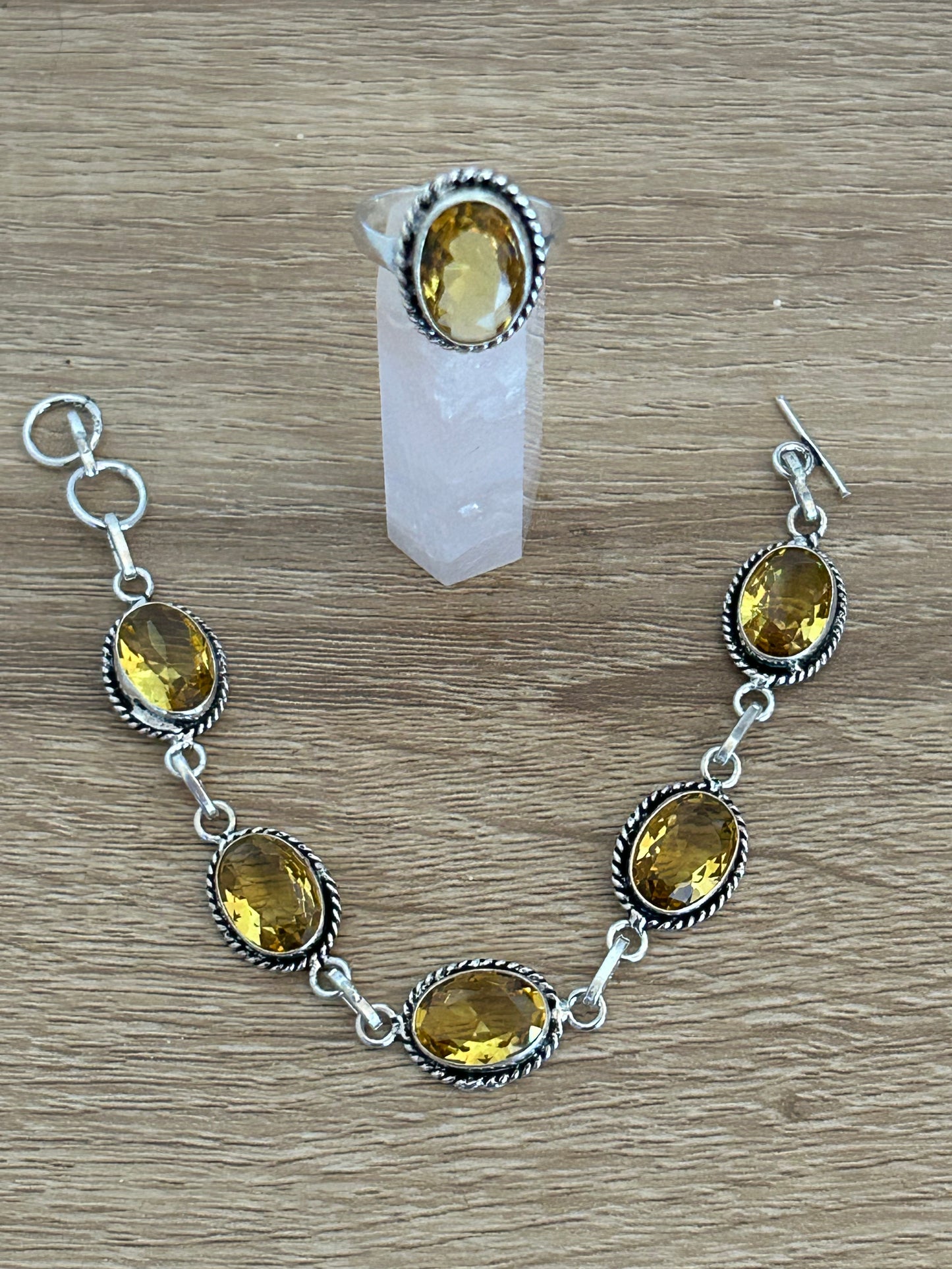 Faceted Citrine and 925 Sterling Silver Bracelet and Ring Set. The bracelet contains 5 large citrine gems and the ring one