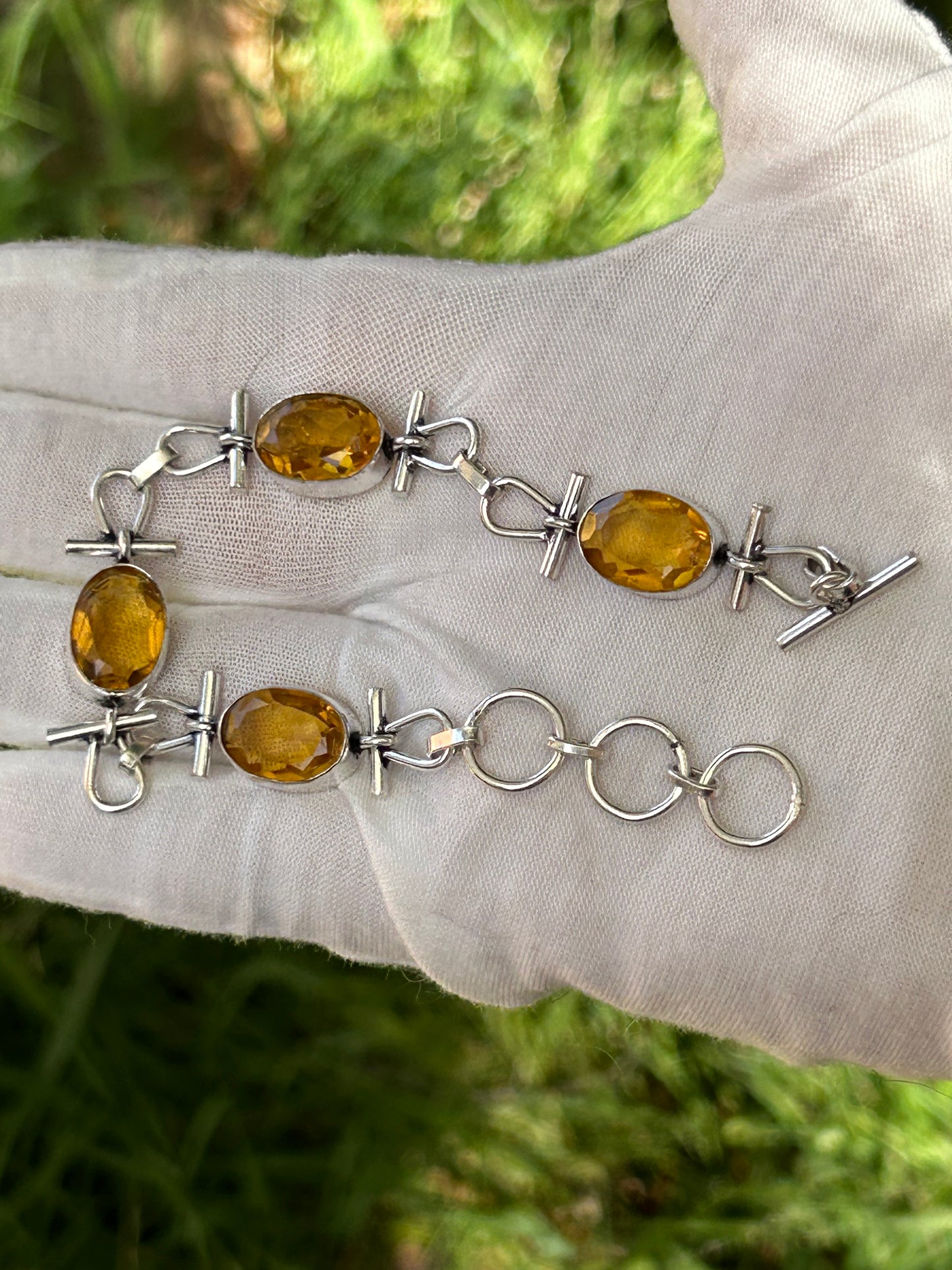 Citrine and silver bracelet with four large faceted citrine gems
