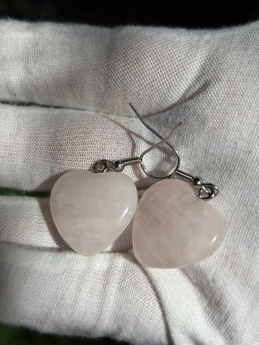 Heart shaped rose quartz crystal dangle earrings with silver attachment and hoops