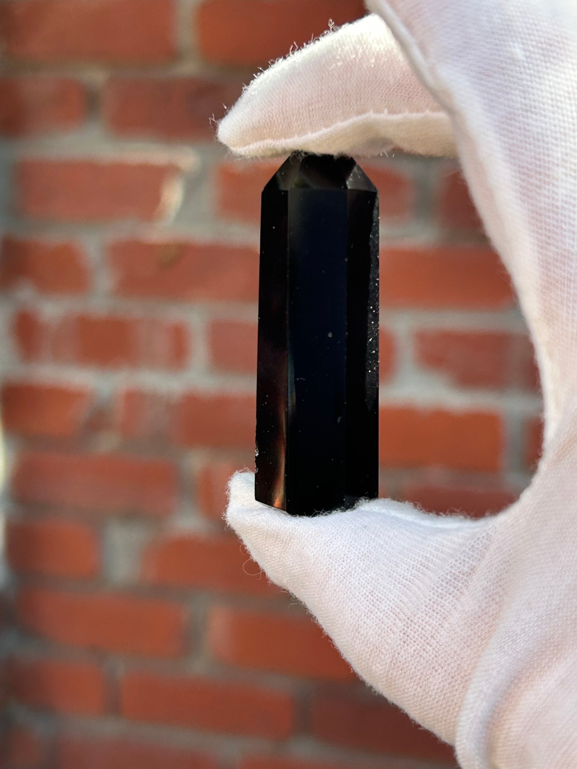 black obsidian point crystal