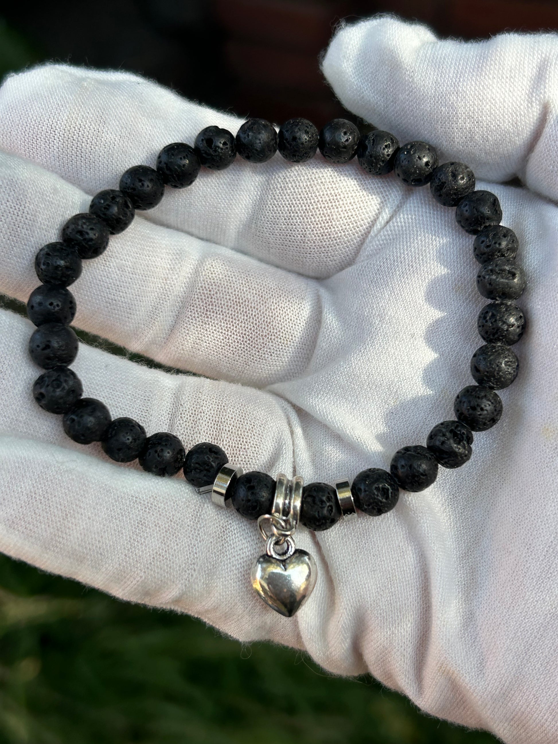 Lava Rock Bead Bracelet with silver heart charm