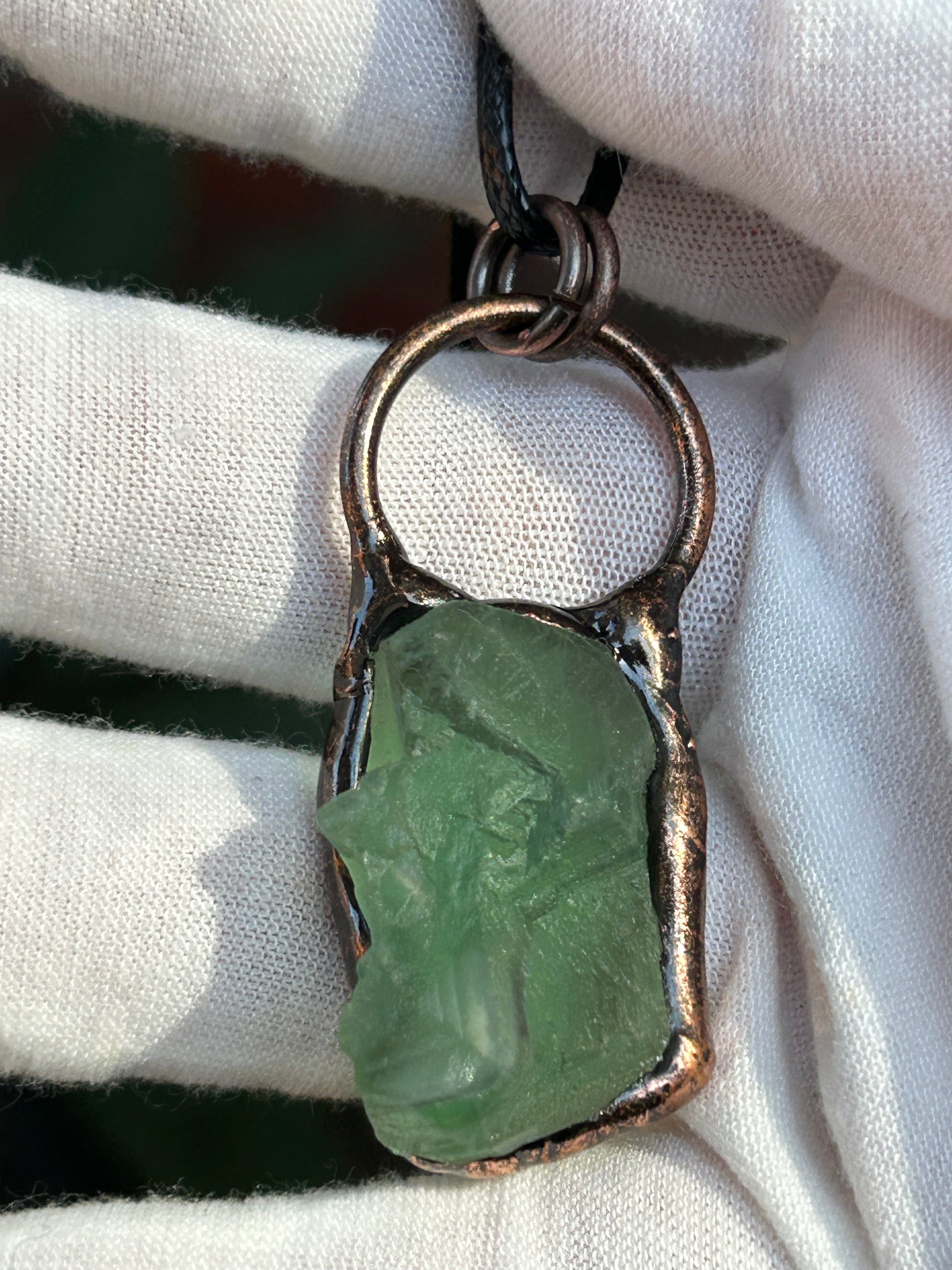 raw green flourite pendant in antique rustic copper setting