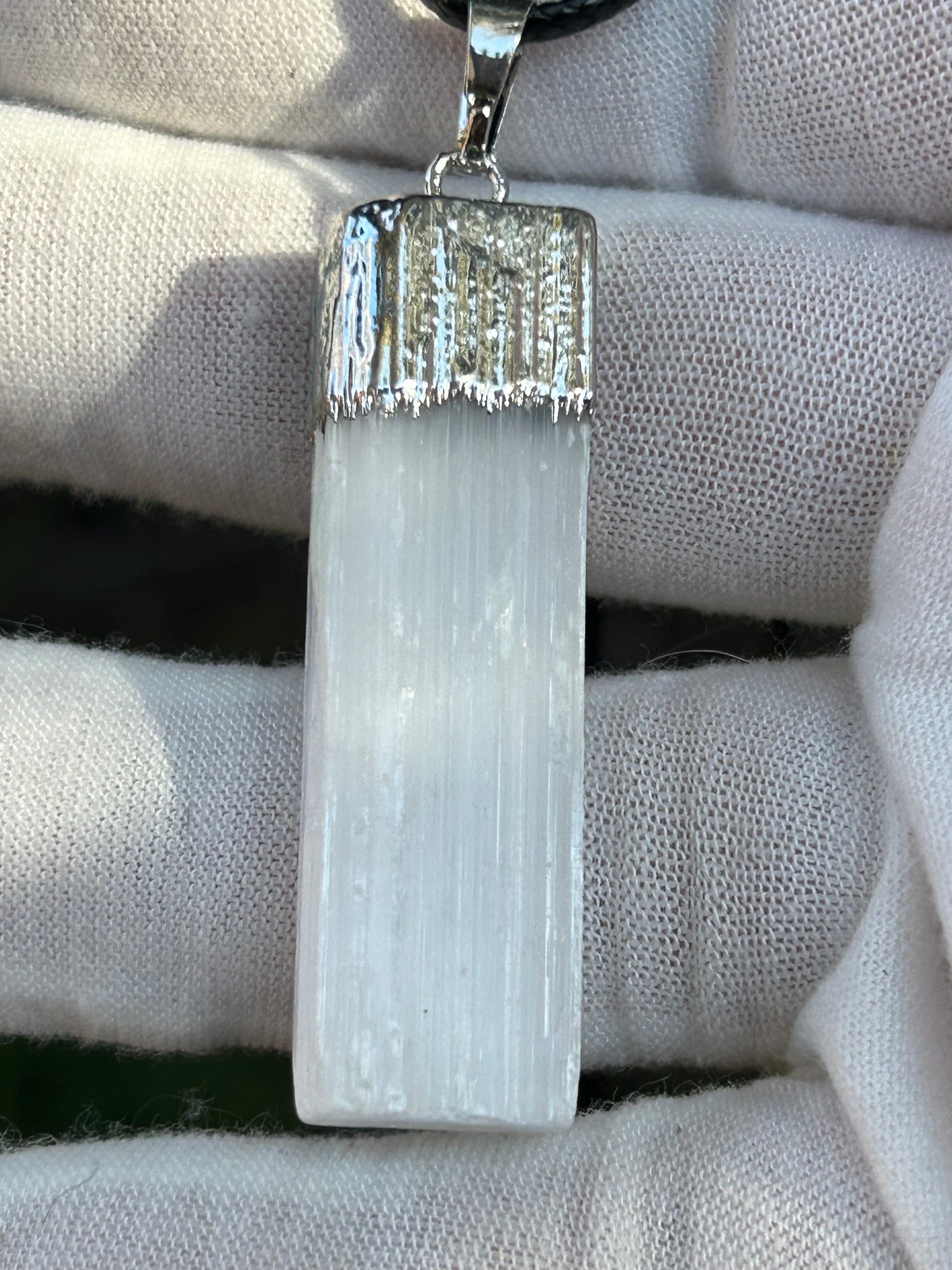 Selenite Cuboid pendant with silver top and black cord necklace