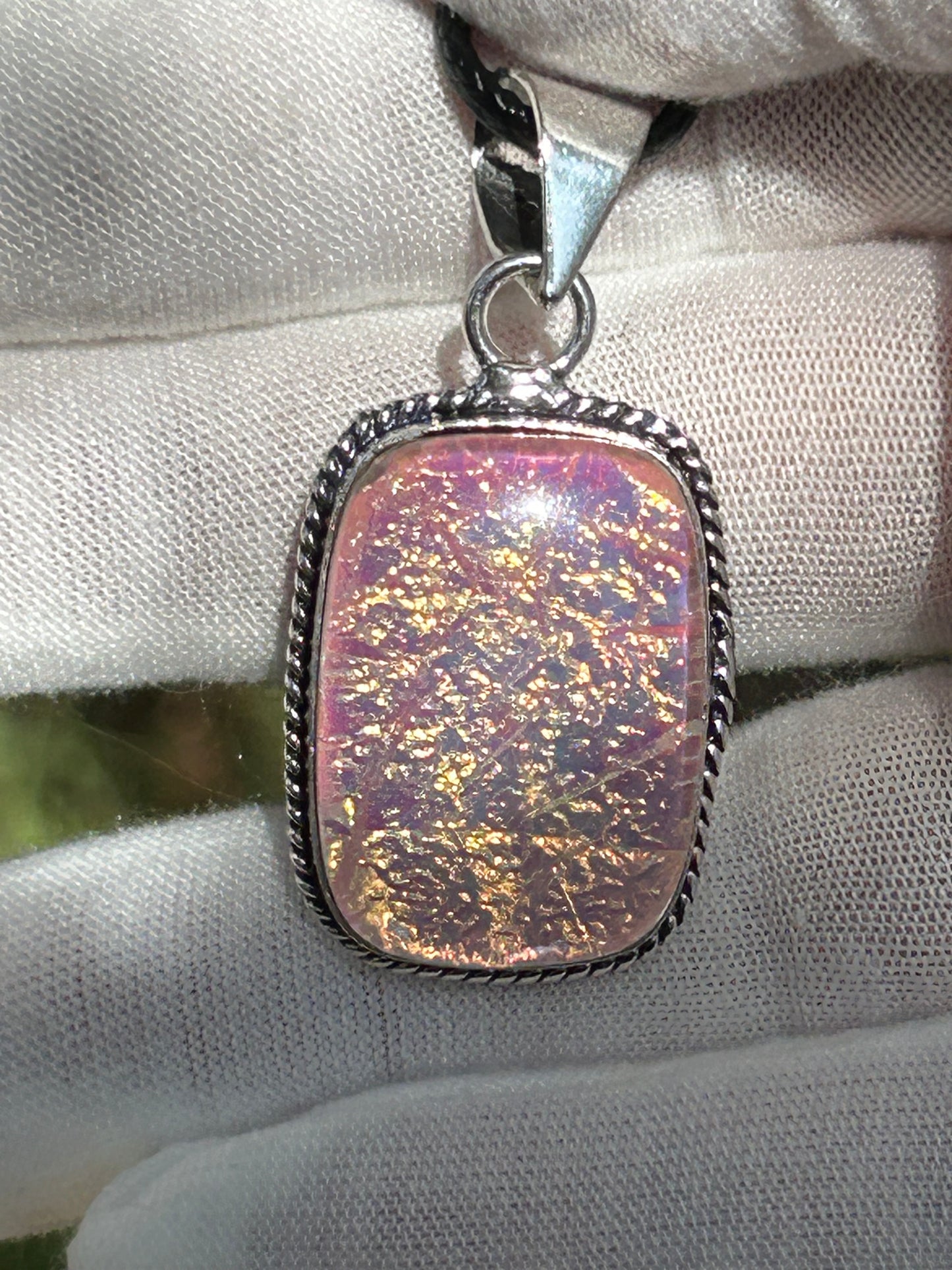 dichroic glass pendant with 925 sterling silver plated setting and black cord necklace