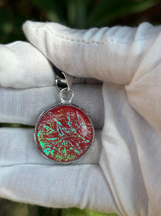 dichroic glass pendant with 925 sterling silver plated setting and black cord necklace