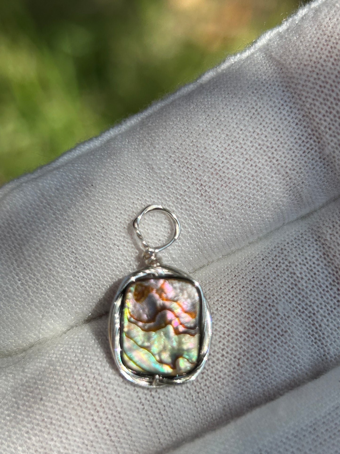 Small Paua Abalone shell silver wrapped pendant or charm