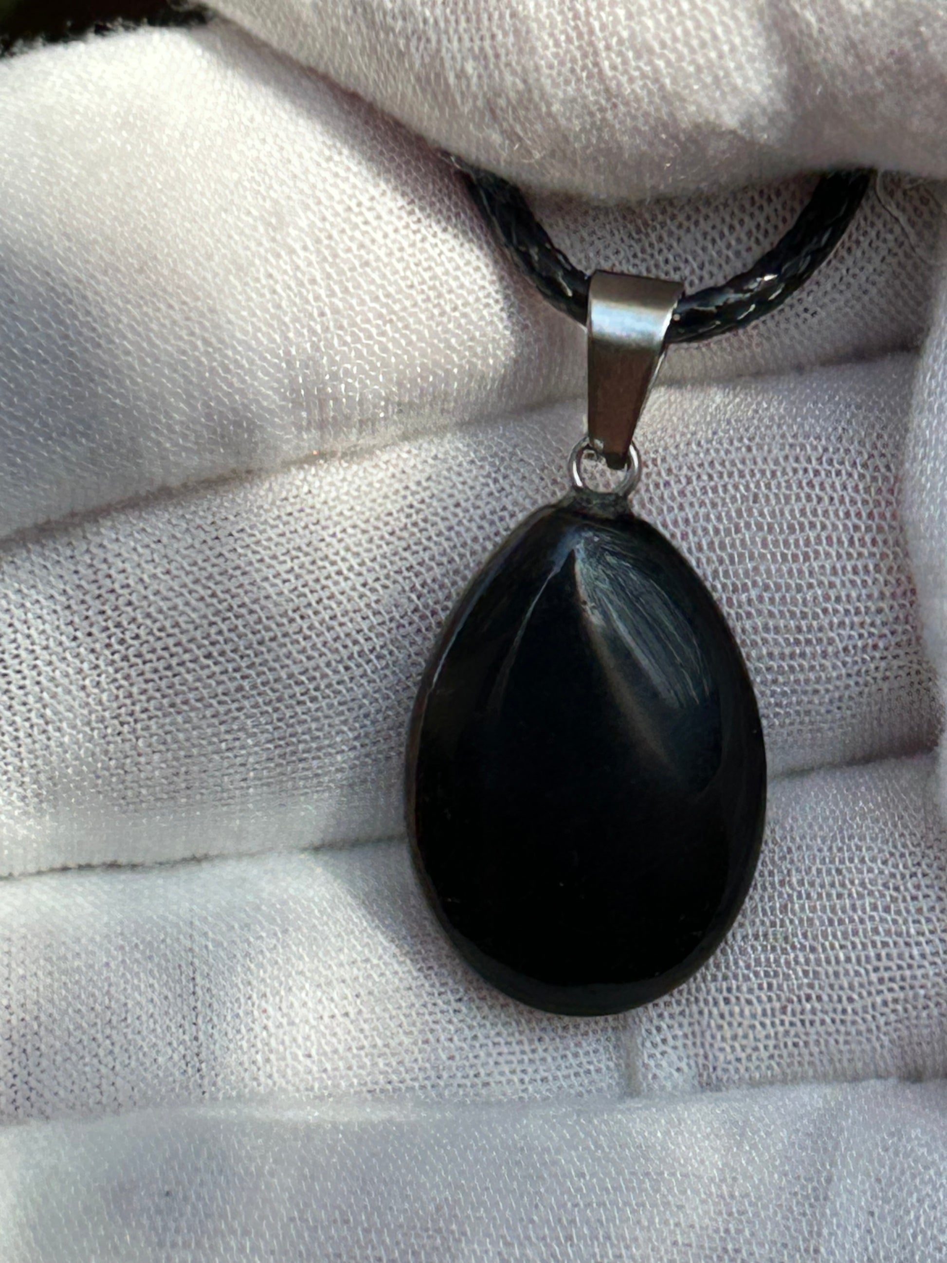 Black Obsidian Polished Rain Drop Pendant with silver pendant attachment and black cord necklace