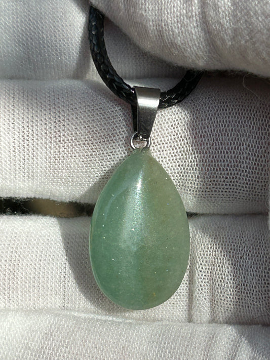 Green Aventurine rain drop shaped pendant with silver pendant attachment and black cord necklace