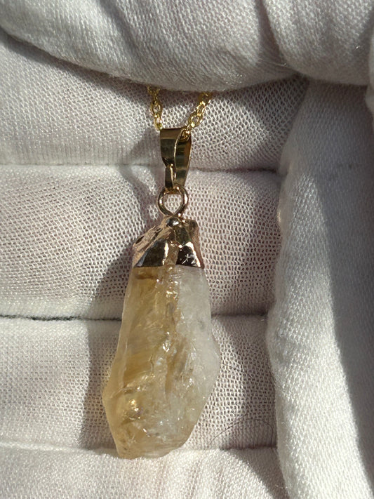 raw citrine pendant dipped in gold brass with matching brass necklace