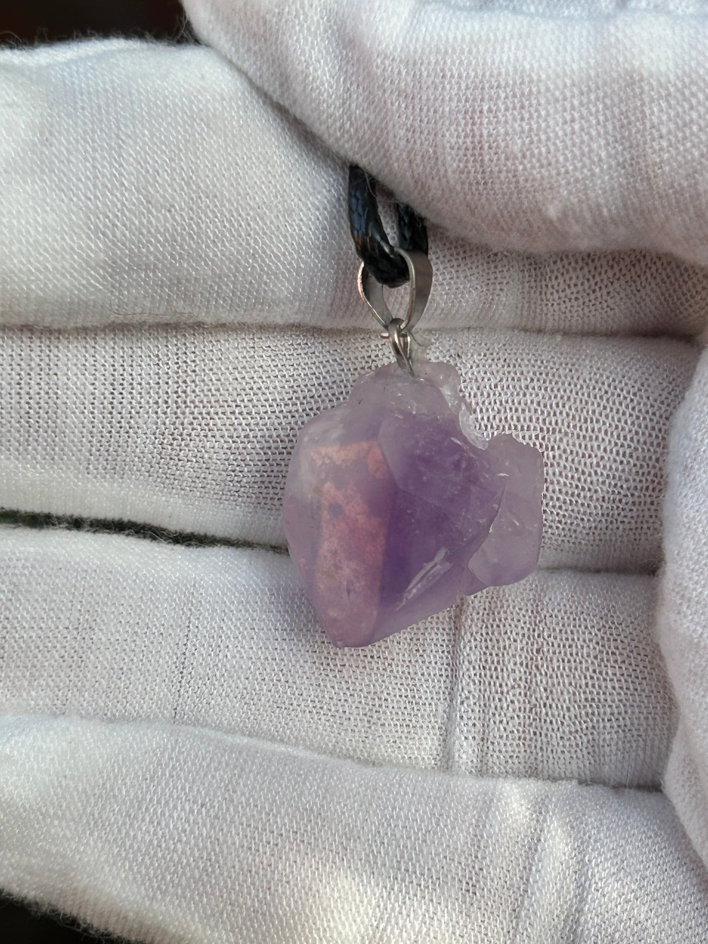 Raw Amethyst Crystal Pendant with silver pendant attachment and black cord necklace