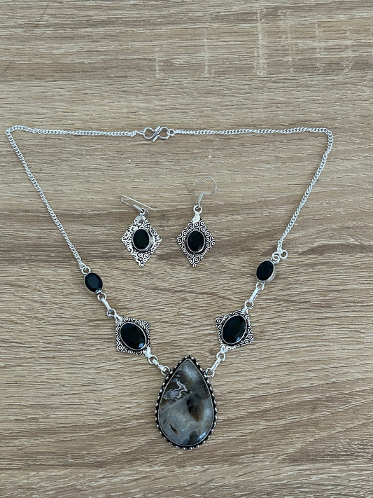 Stick Agate, Black Onyx and 925 Sterling Earrings and and Necklace Set. The necklace features a large stick agate water drop stone and 4 black onyx gems, and the earrings have one black onyx gem per piece.