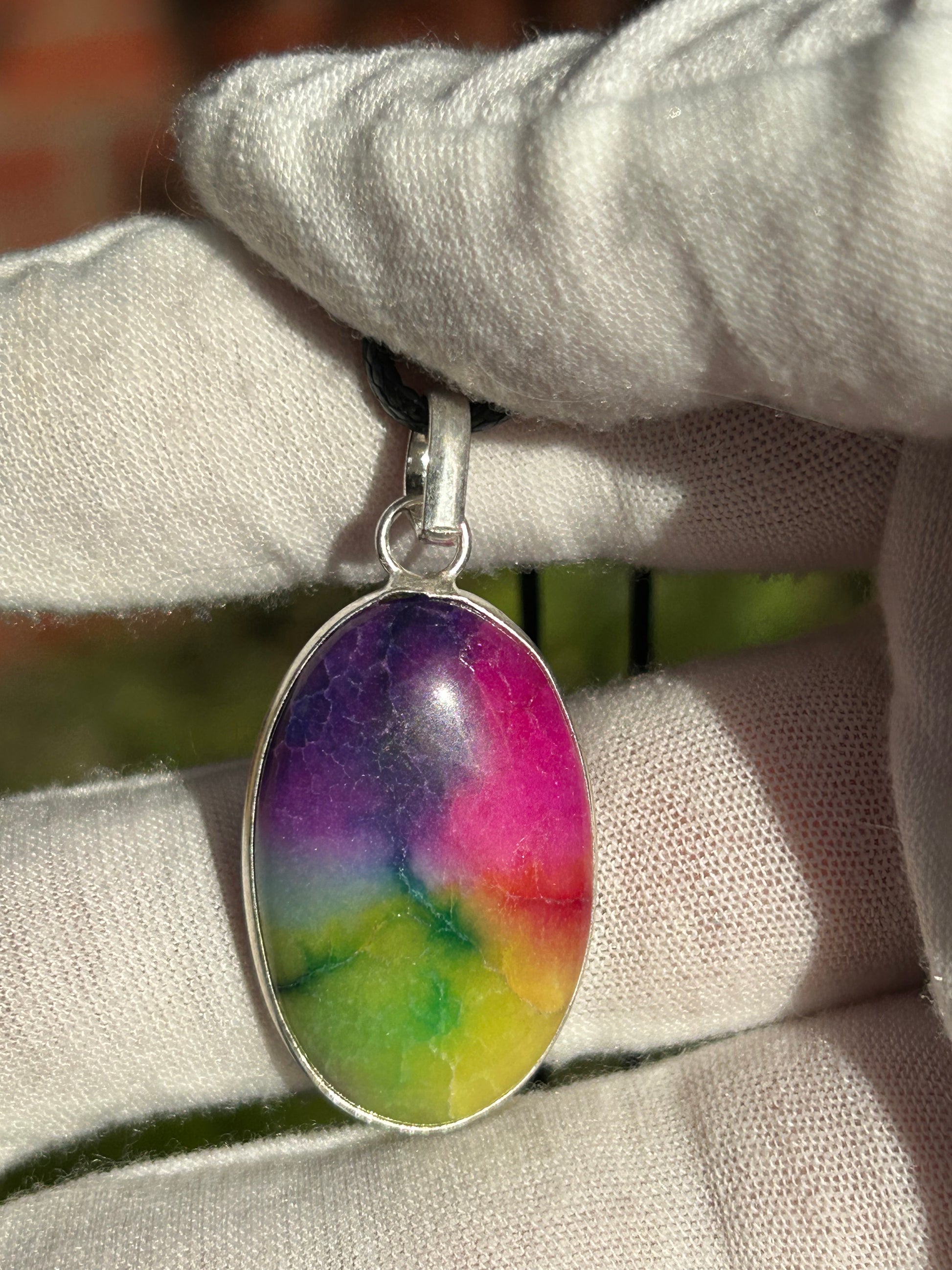 Rainbow Solar Quartz Pendant with a 925 Sterling Silver Setting and black cord necklace