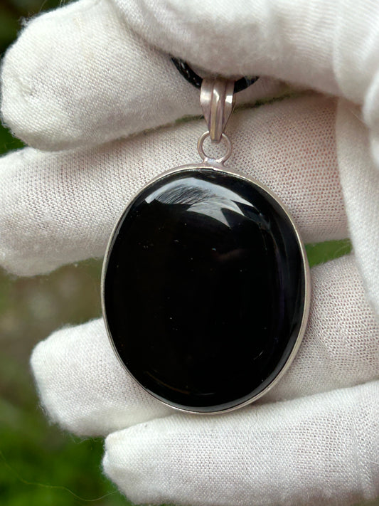 Black Onyx Polished Stone Oval Pendant with black cord necklace