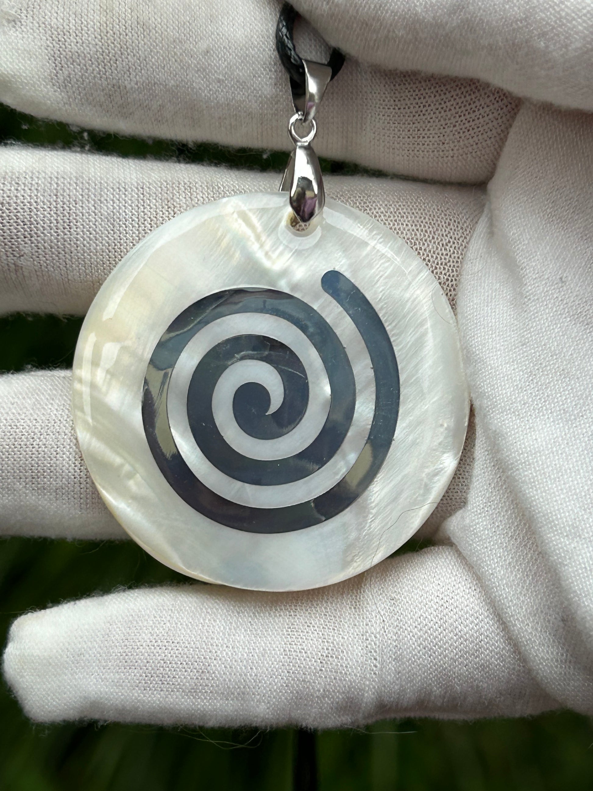 large round Mother of Pearl Shell Embossed Pendant with black cord necklace