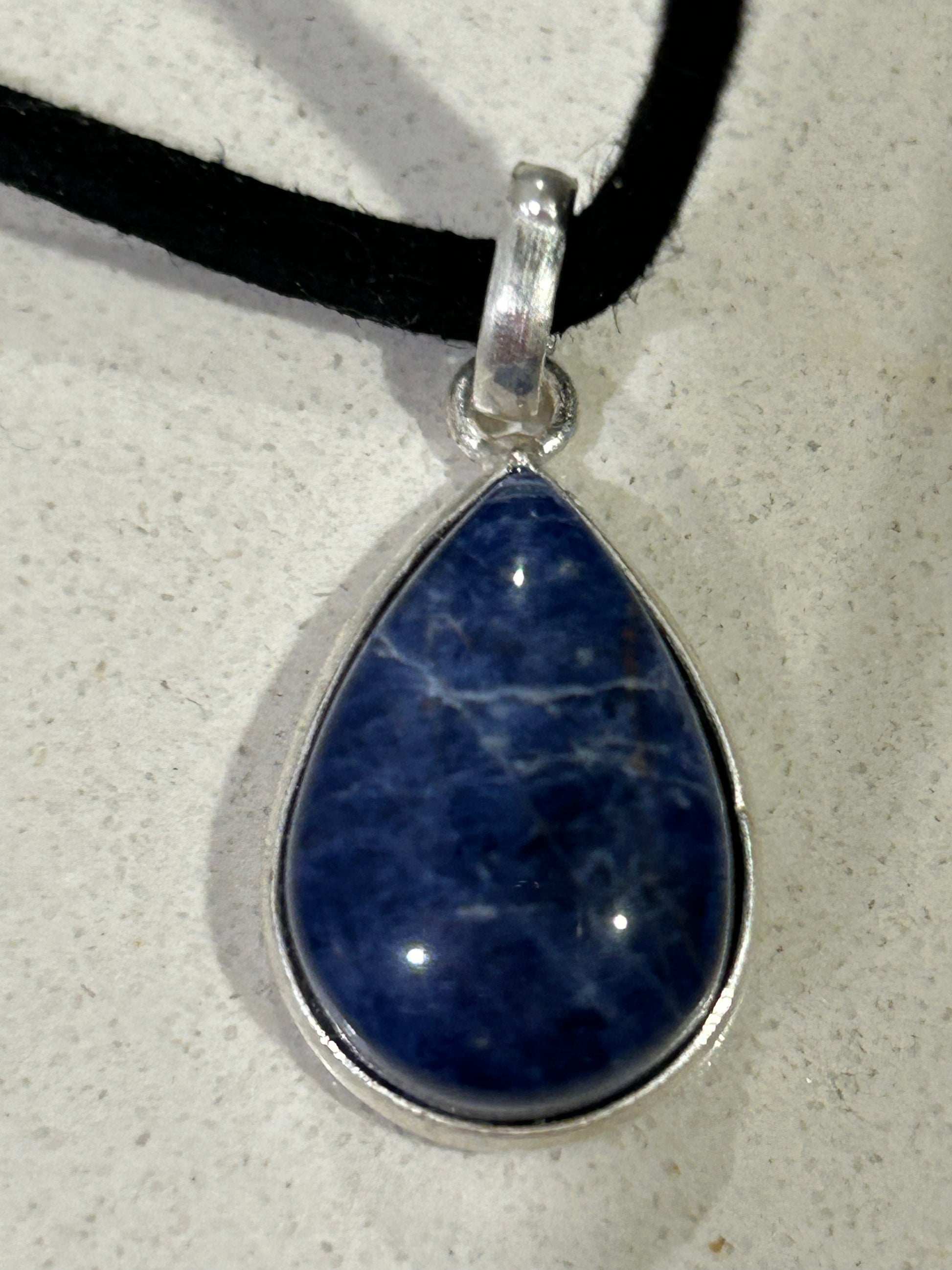 sodalite water drop pendant in silver setting