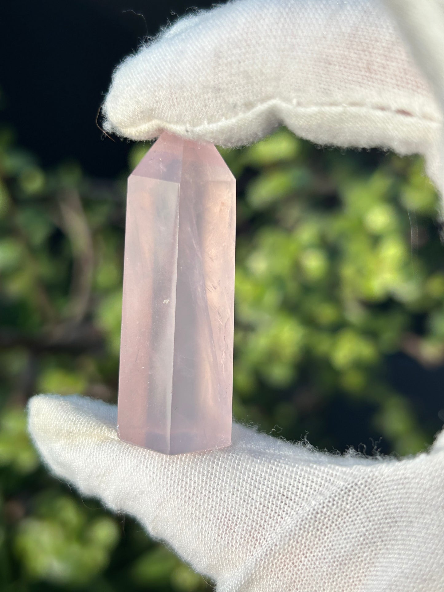 Rose quartz crystal point